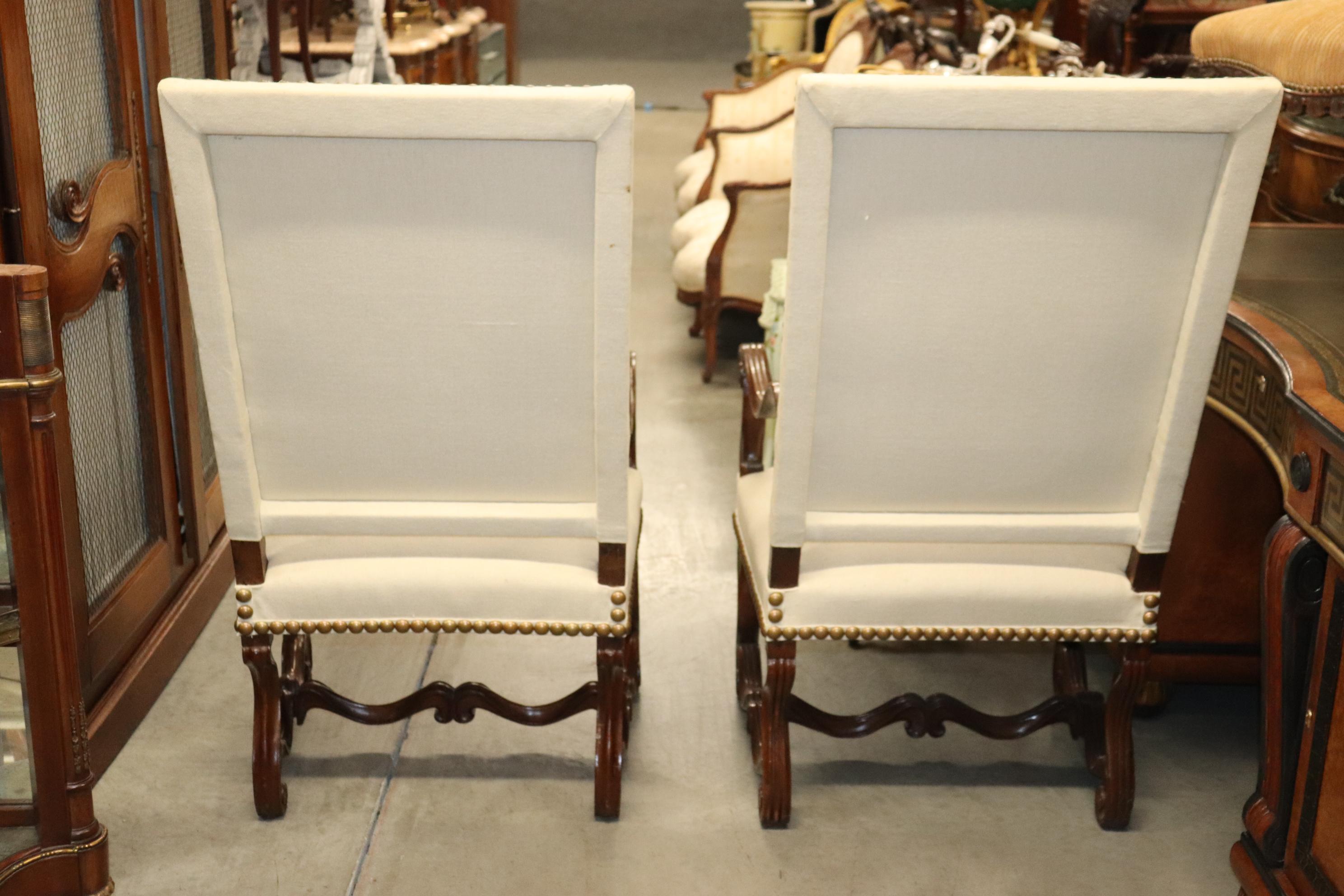 Walnut Companion Near Matched Pair of Brass Studded French Mutton Leg Armchairs
