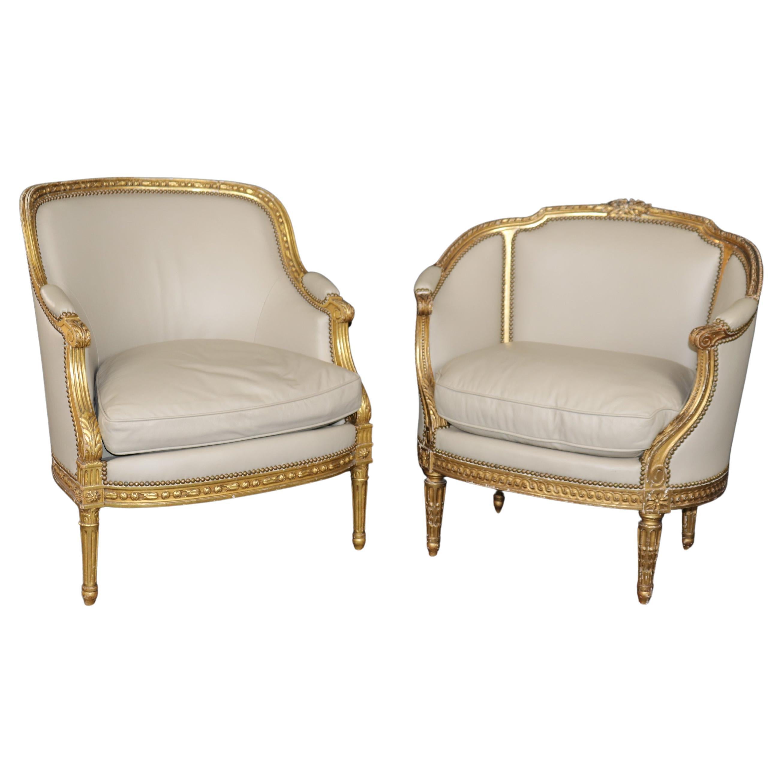 Companion Pair Louis XVI Style gold Gilt & Leather Upholstered Arm Chairs For Sale