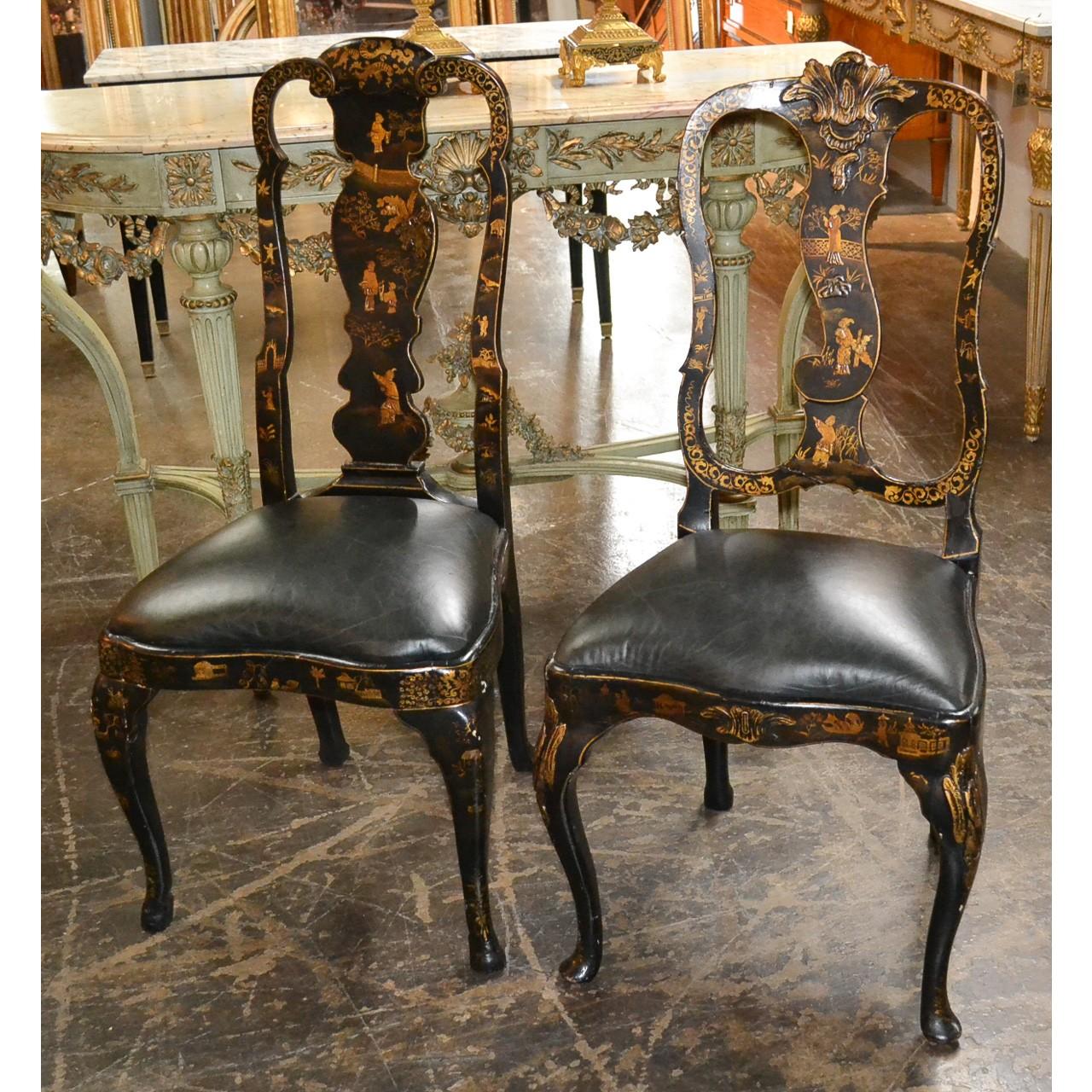 Antique pair of companion English black chinoiserie side chairs with black leather seats, circa 1840.
This pair of mis-matched chairs work so well together with each one having beautiful scenery designs. A designers dream find. Made in England.