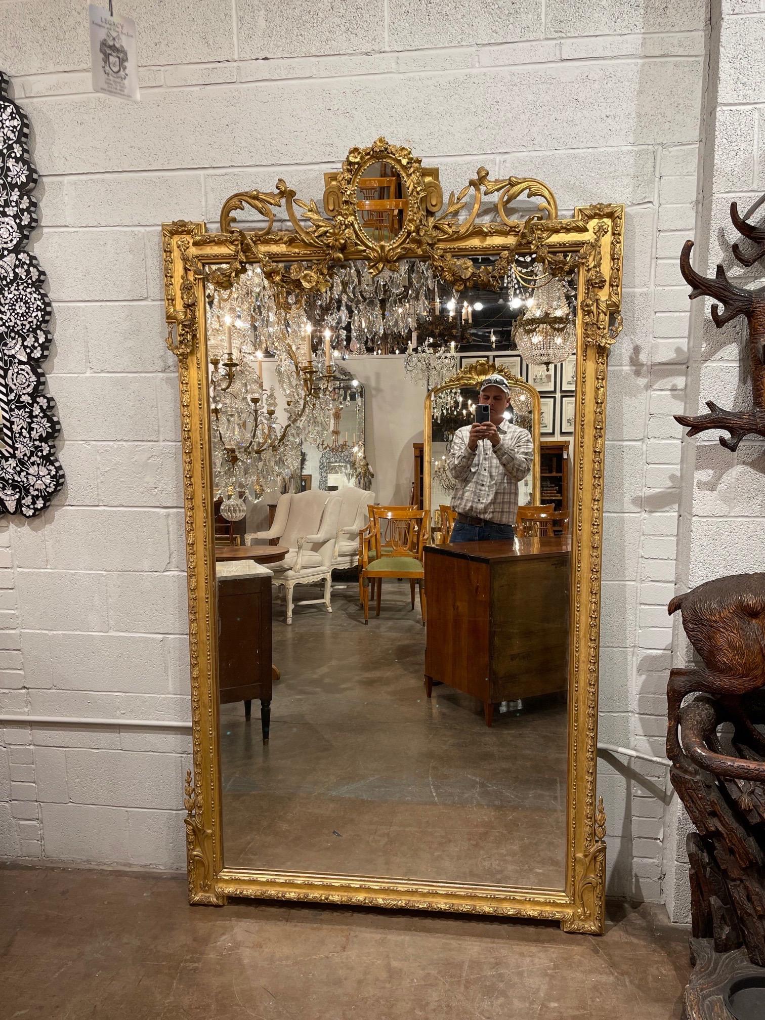 Exceptional companion pair of 19th century French Louis XVI style carved and giltwood mirror. Very fine carvings and beautiful gilt on this pair. Makes a very impressive statement!
Note: Sizes are slightly different 46 x 85 and 49 x 87.