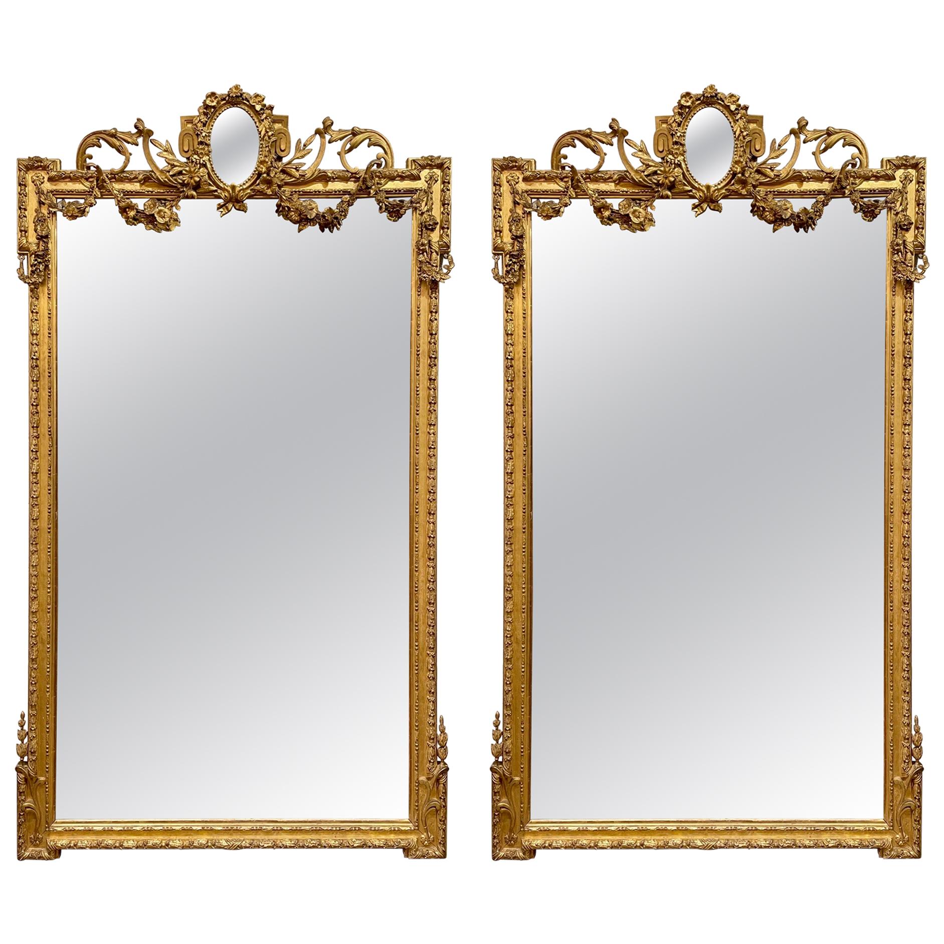 Companion Pair of 19th Century French Louis XVI Style Carved and Giltwood Mirror