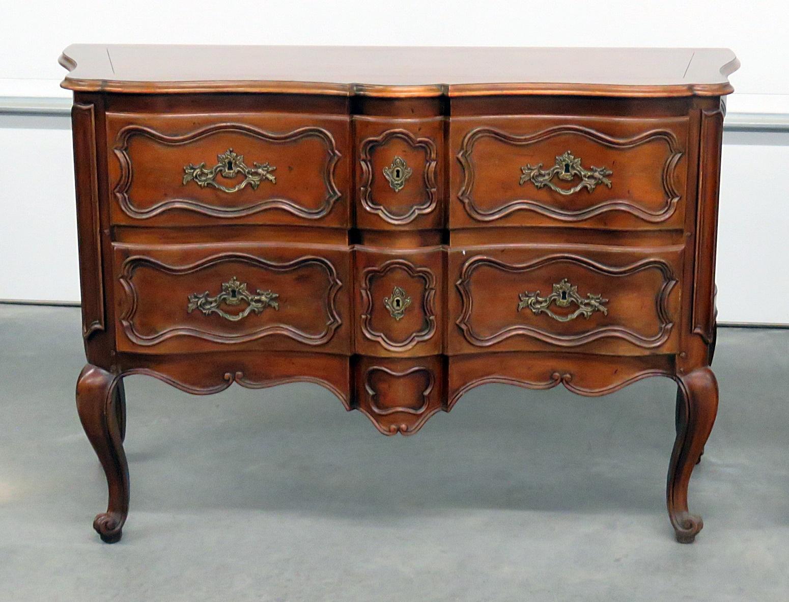 Companion pair of Baker Country French 2-drawer commodes.