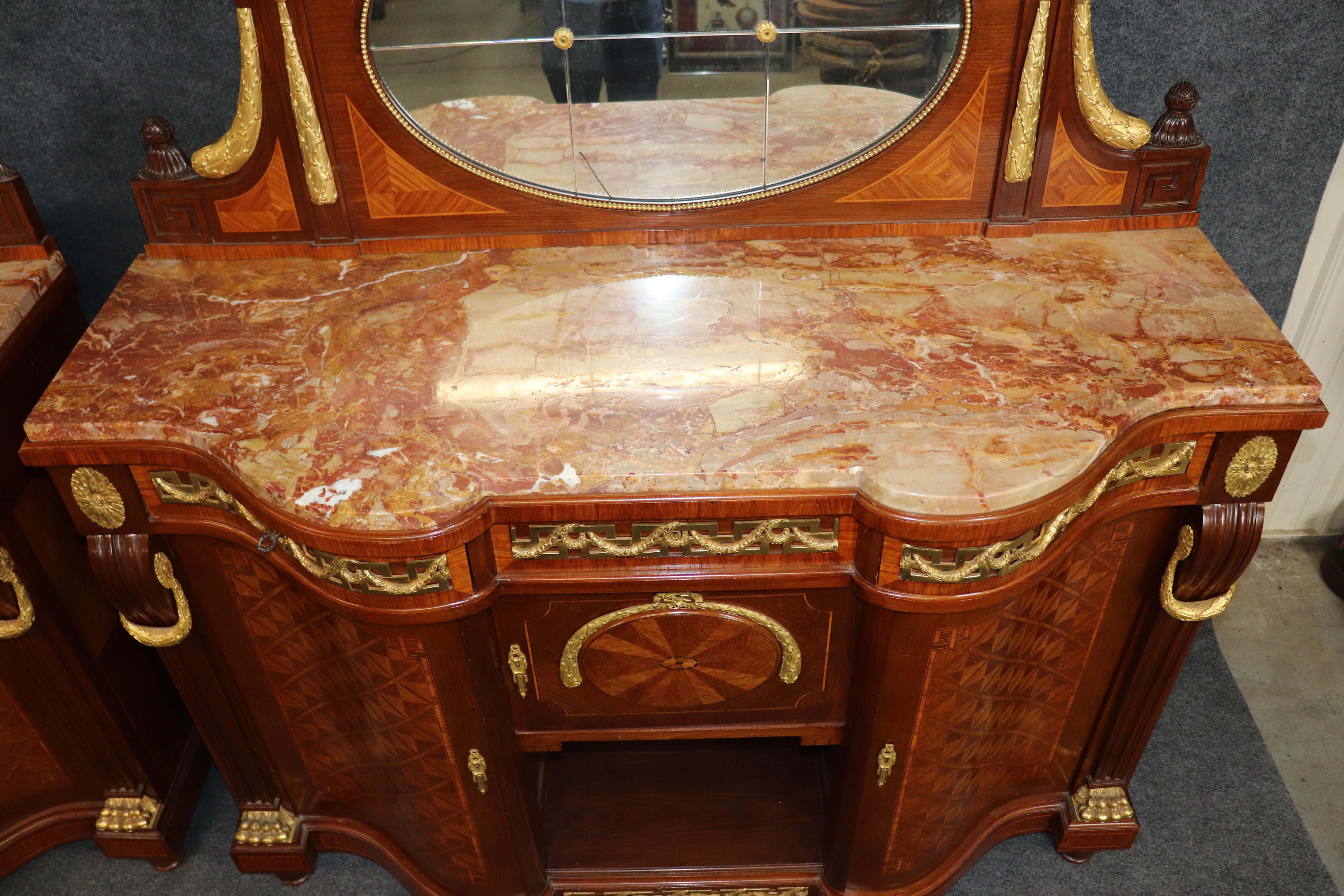 Fine XIX secolo Coppia di orologi francesi in bronzo dorato De Cooene Freres Attr. Buffet in vendita