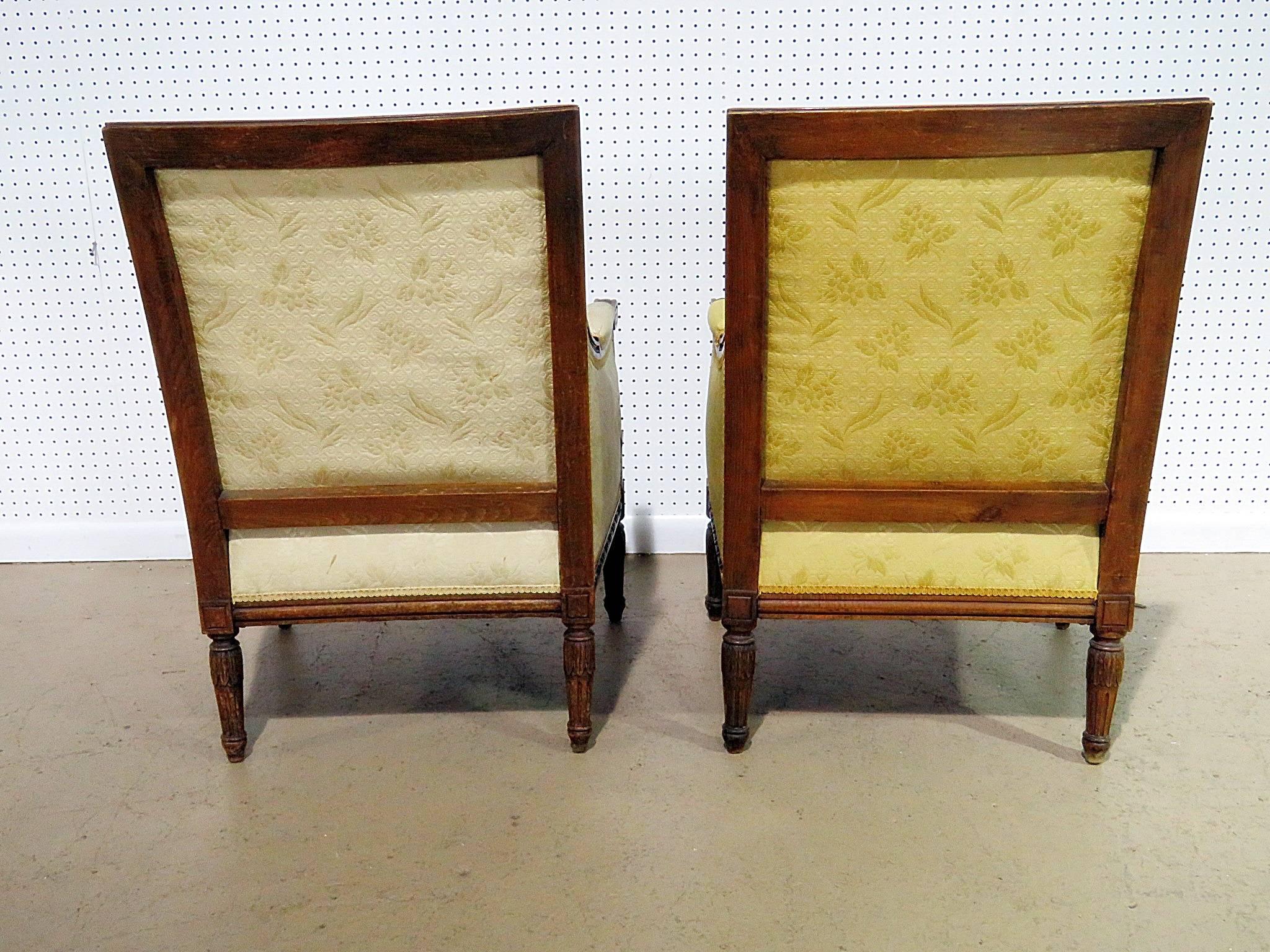 Carved Companion Pair of Louis XVI Style Bergeres