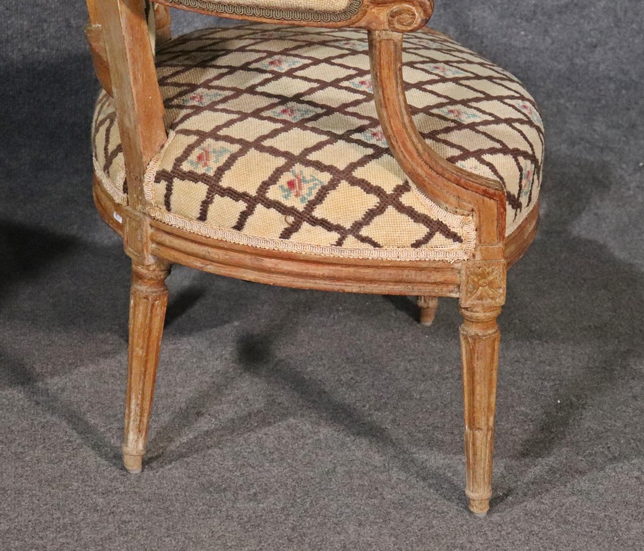 Companion Pair of Nearly Identical French Louis XVI Armchairs, Circa 1900 For Sale 5