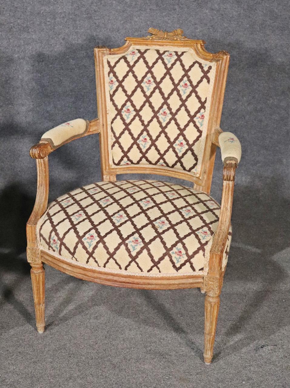 Early 20th Century Companion Pair of Nearly Identical French Louis XVI Armchairs, Circa 1900 For Sale