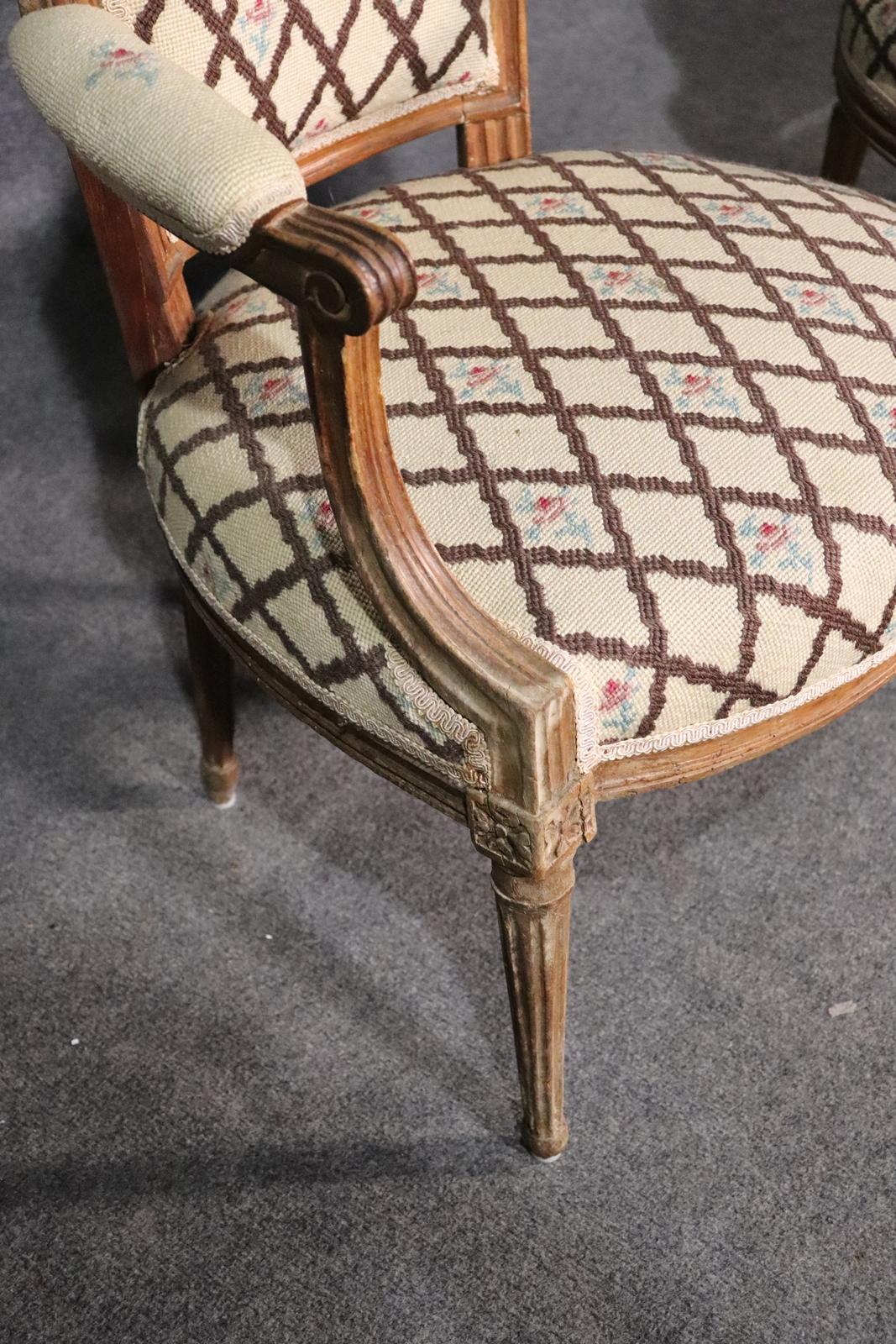 Walnut Companion Pair of Nearly Identical French Louis XVI Armchairs, Circa 1900 For Sale
