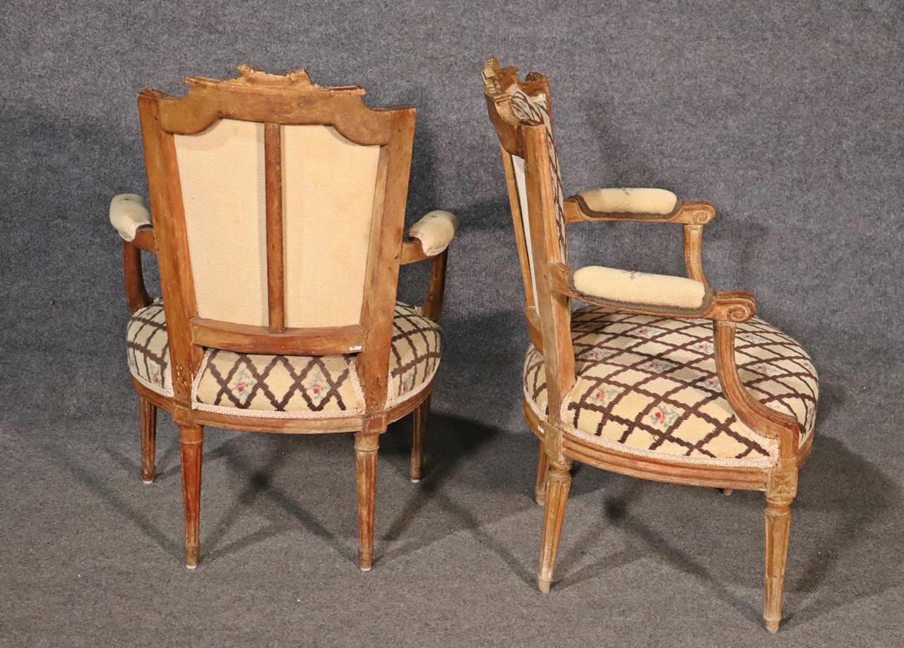 Companion Pair of Nearly Identical French Louis XVI Armchairs, Circa 1900 For Sale 4