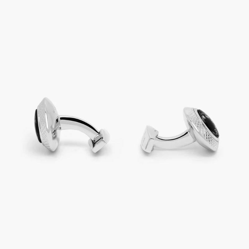 Compass cufflinks in stainless steel

The concept of moving mechanicals and a sense of playfulness are signature elements of the Tateossian collections. Available as a fully functional compass with a smooth domed glass top. Set in rhodium plated