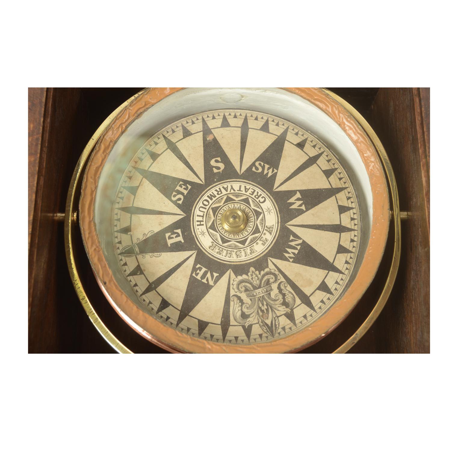 antique nautical compass with box