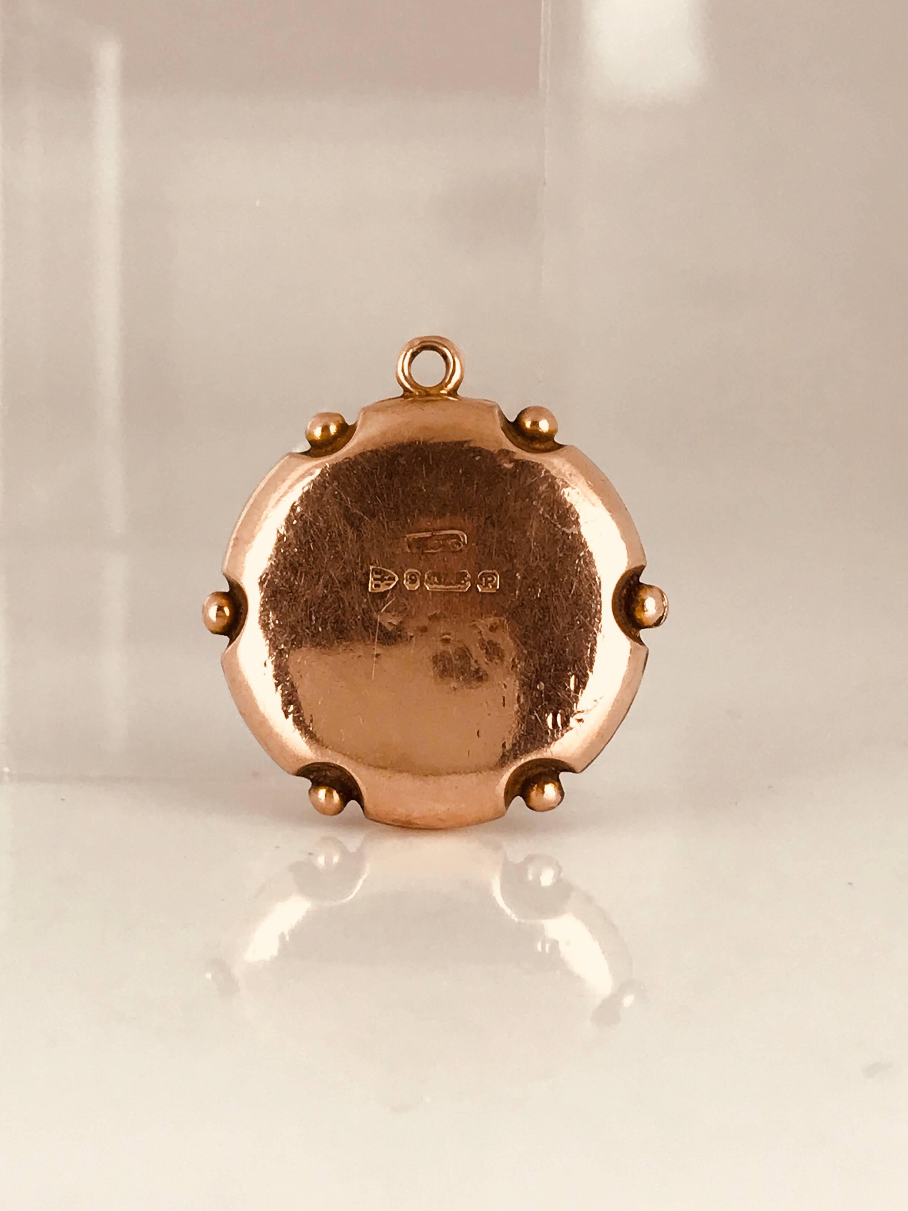 Compass made in a 9 Karat Rose Gold metal. Victorian ERA. 
All Hand Painted.

Stamping in back shows hallmarks not very clear.  European stamping.

GIA Gemologist Inspected