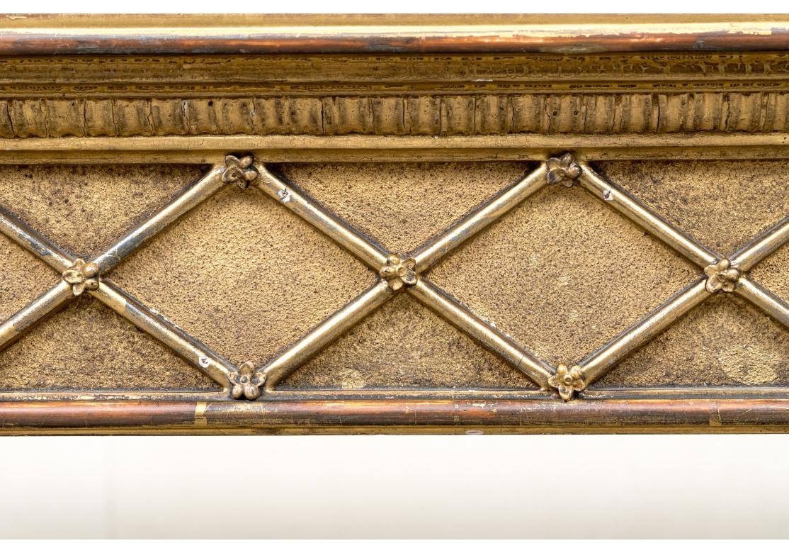 Georgiano Coppia compatibile di console antiche in legno dorato con piani in marmo in vendita
