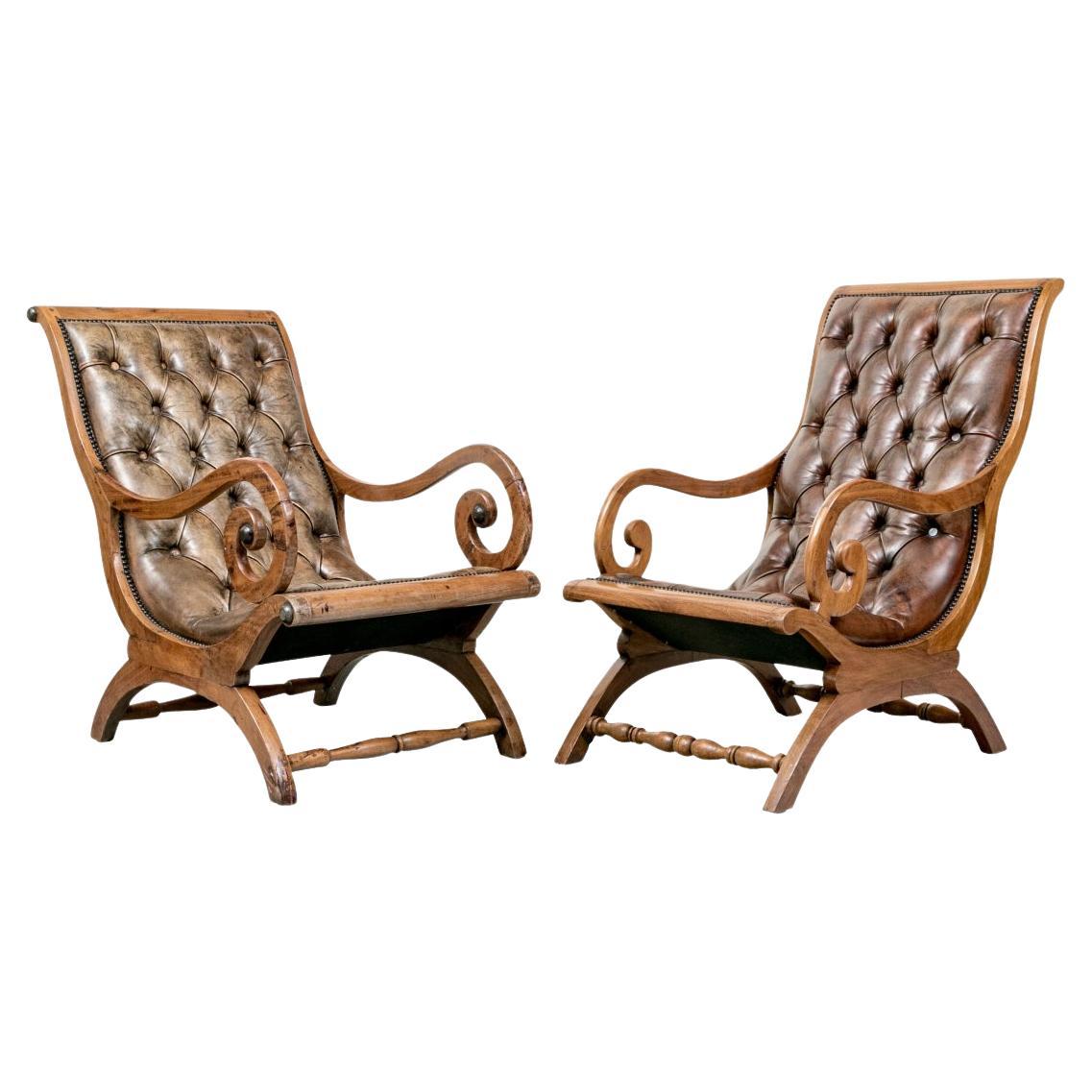 Compatible Pair Of Mahogany Leather Upholstered Lolling Chairs