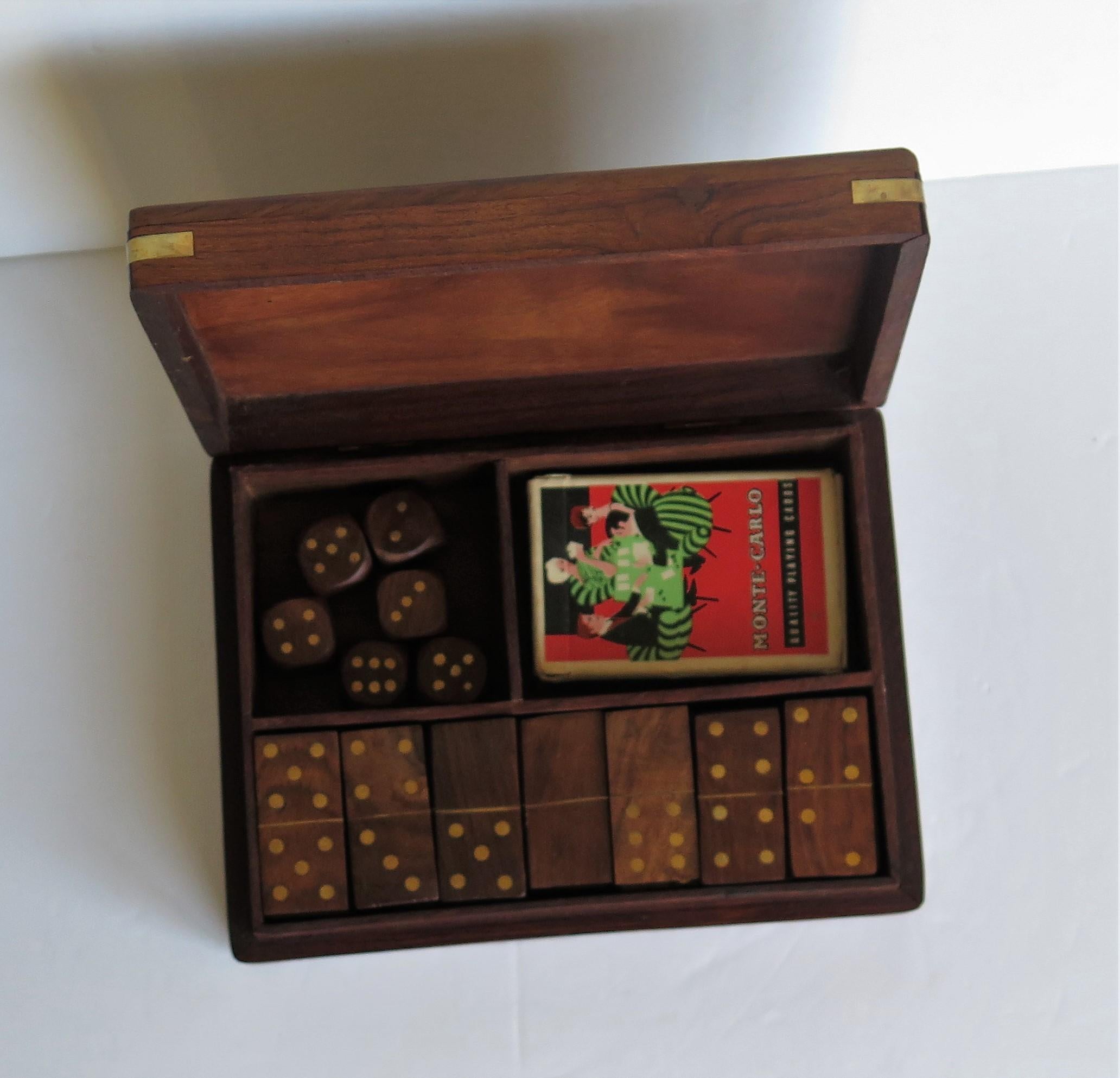 This is a very good handmade Inlaid, lidded games box or compendium, complete with a 6-spot Dominoe set, 6 dice and a set of playing cards, which we date to the mid-20th century, circa 1940s.

This is a lovely handmade Treen like games box set or