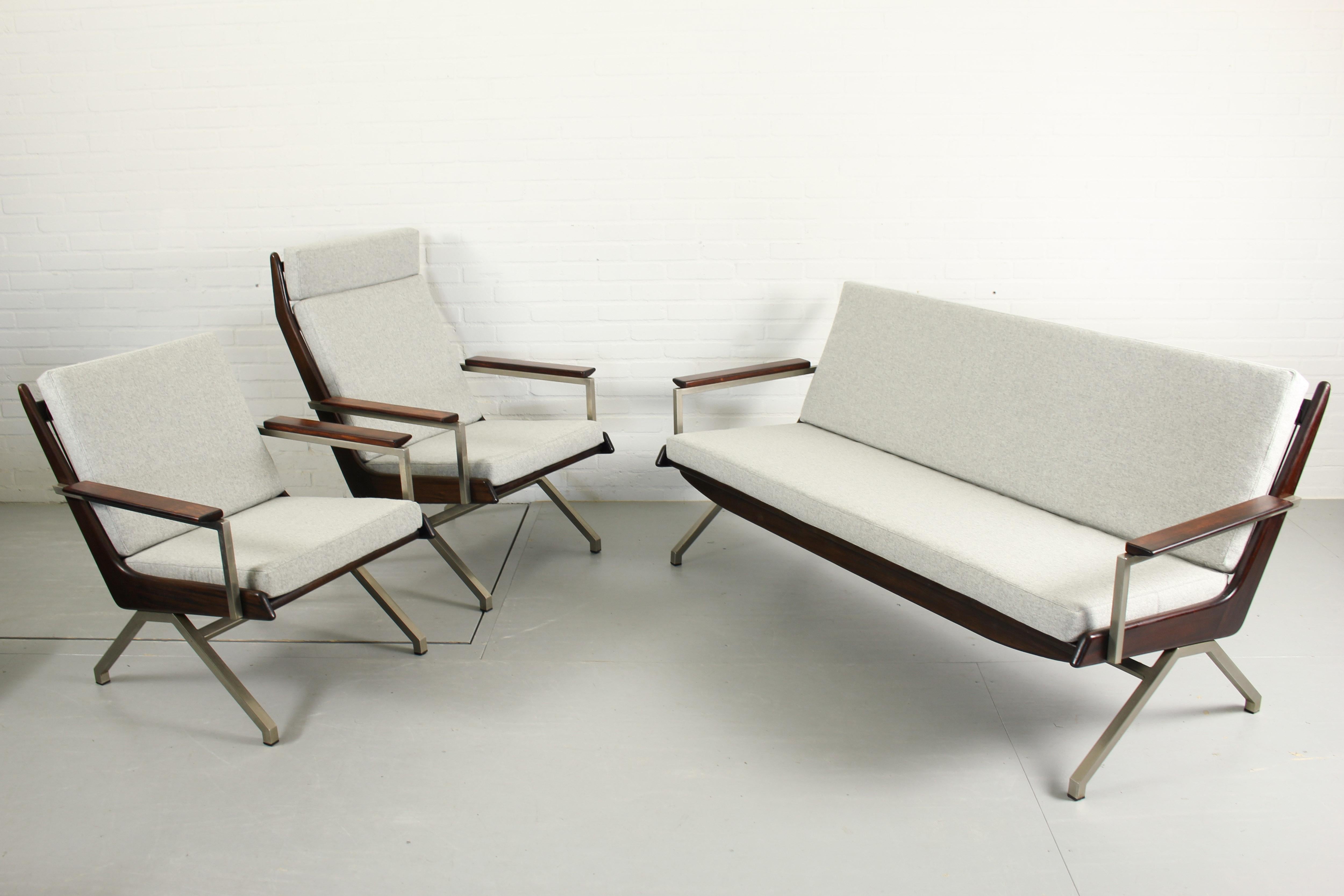 Very rare and unique complete sofa set by Rob Parry for De Ster Gelderland in the 1960s, comprising of a 3 seats sofa, a lady and a highback chair. They have a beautiful grey metal base, lightgrey fabric and tropical hardwooden armrests. Upholstered