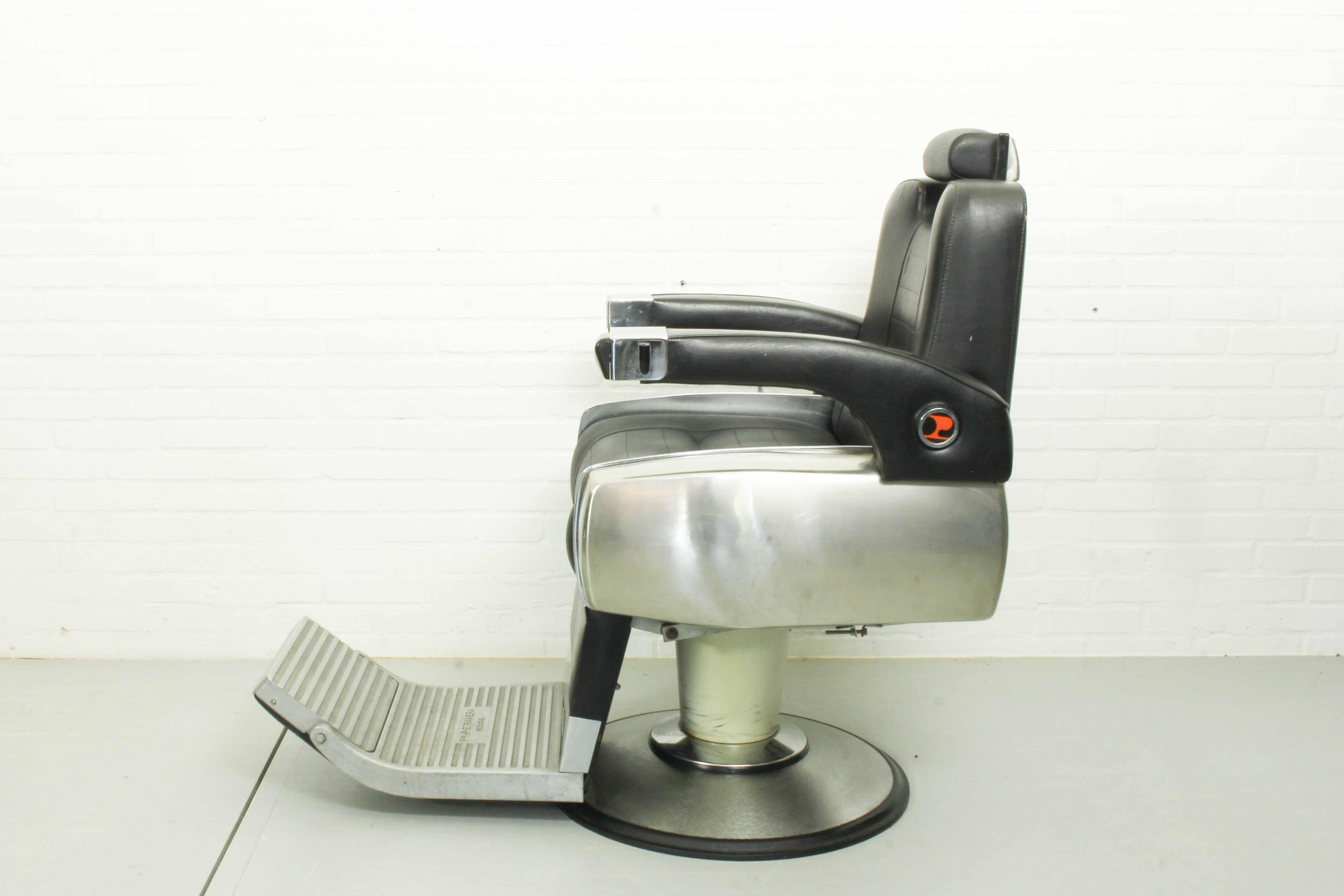 3 Barber chairs from the 60s, Pietranera brand, in good condition, height adjustment and backrest with reclining platform. In working condition, skai is in vintage conditions with tear and wear in accordance with age and use. Counter with tray for