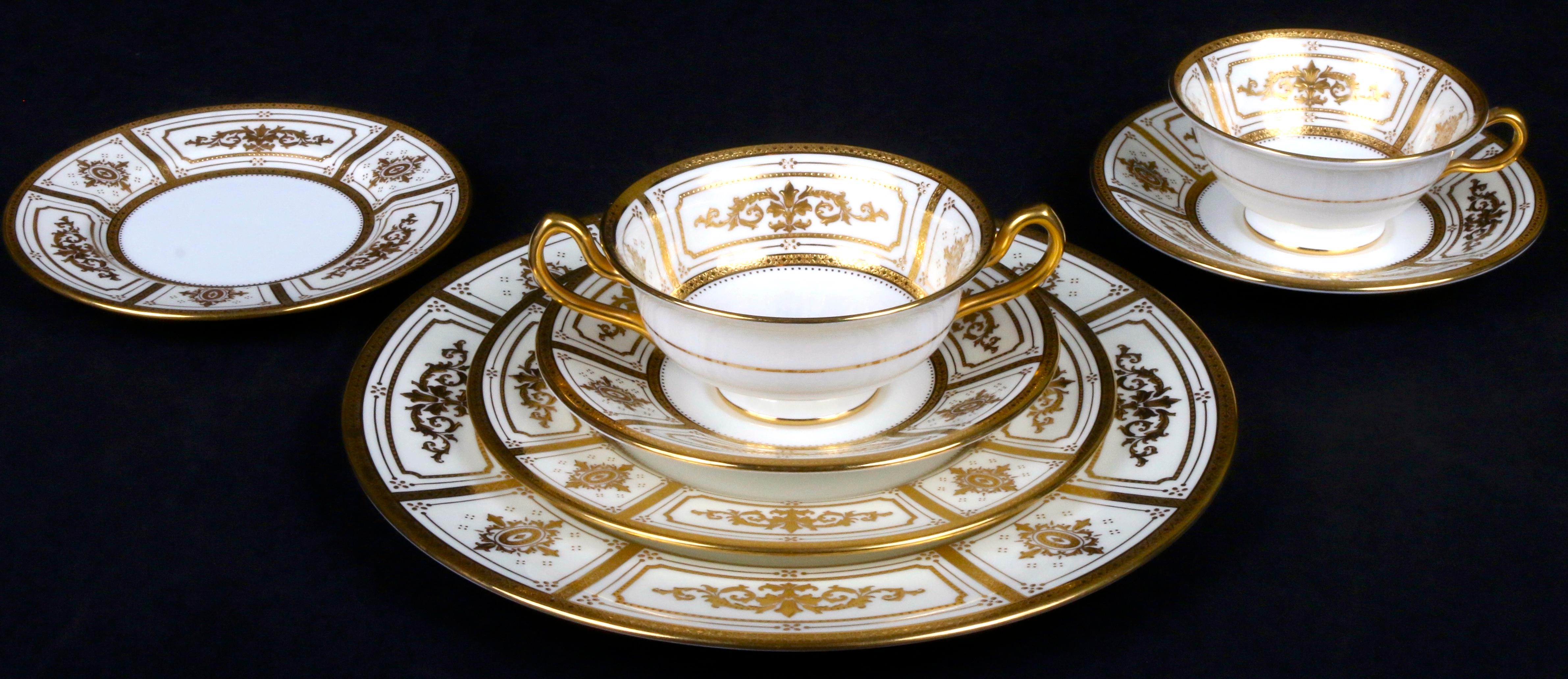 Burnished Complete Service for 12 of Minton for Tiffany Neoclassical Style Gilded Plates For Sale