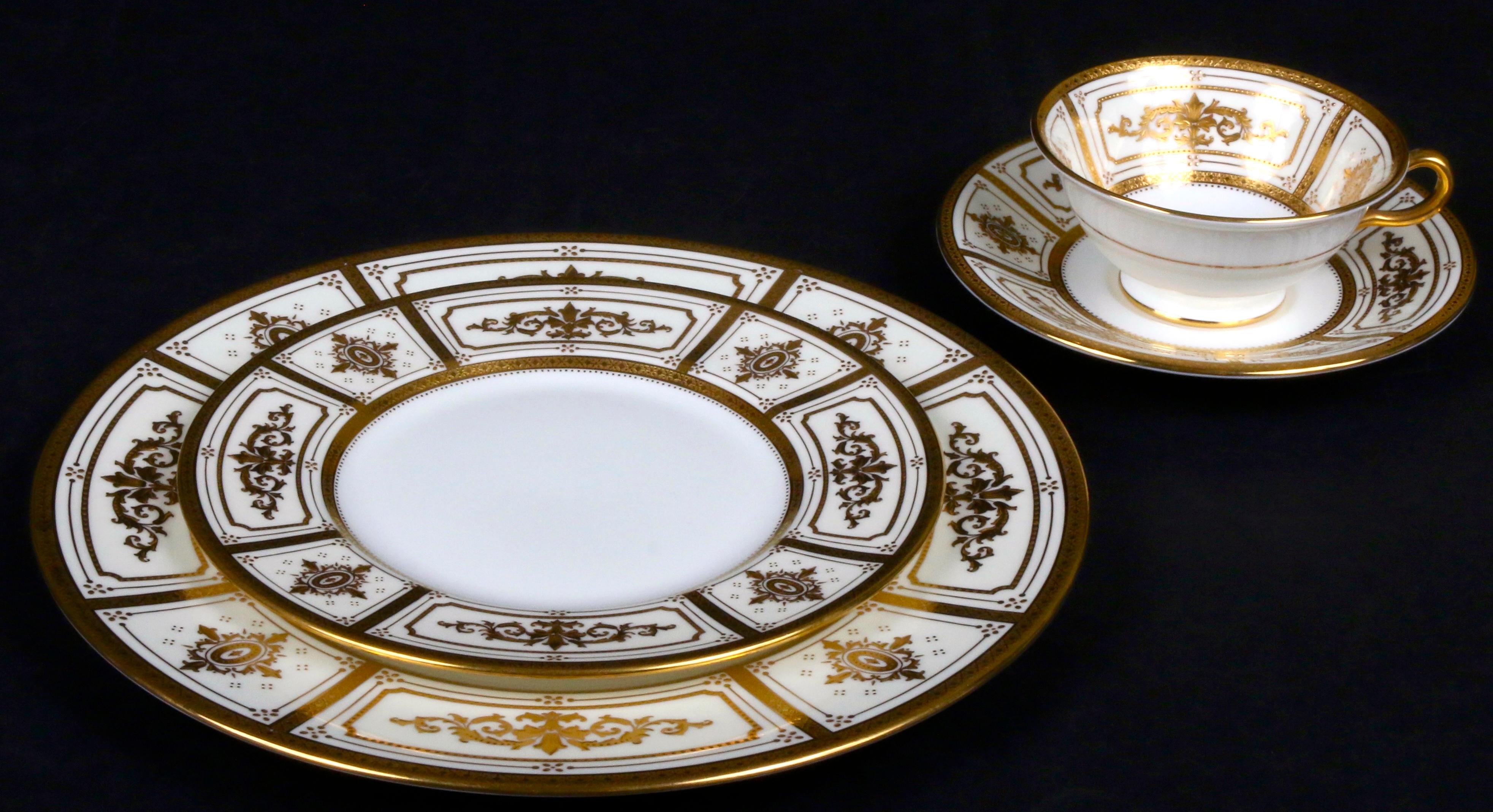 Complete Service for 12 of Minton for Tiffany Neoclassical Style Gilded Plates In Excellent Condition For Sale In New York, NY