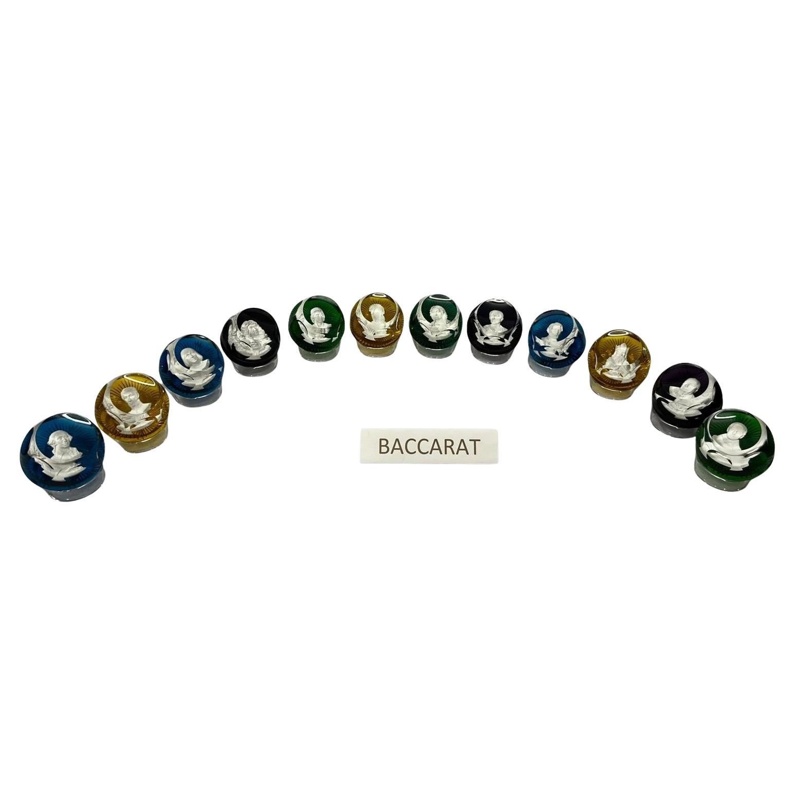 Complete set of 12 paperweights, made by the famous crystal manufacturer from France, Baccarat, for Franklin Mint, made in the late 1970s. 

The Baccarat Crystal Sulphide 3 Dimensional Cameo Paperweights by Baccarat are each signed and dated on the