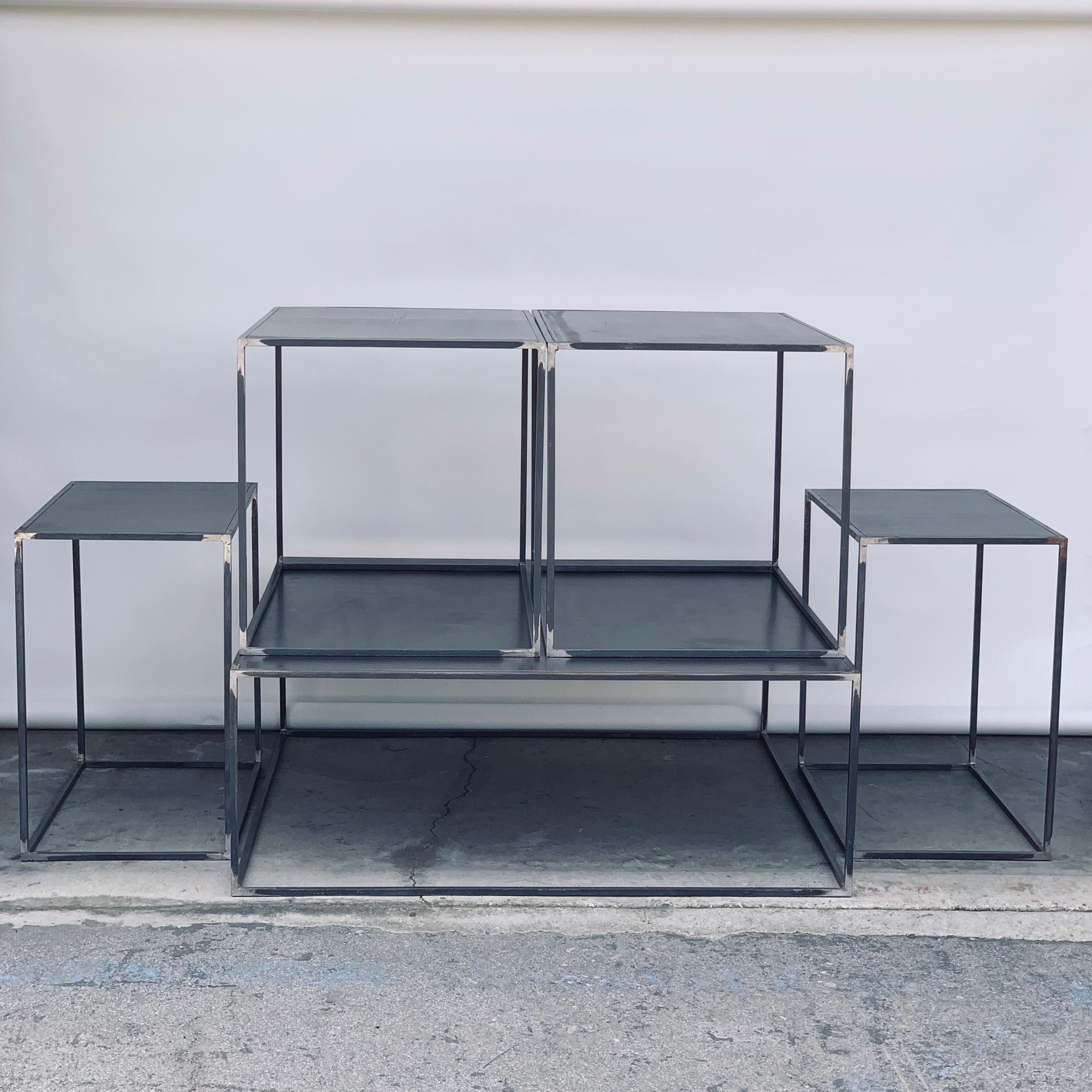 Complete set of 'Filiforme' coffee, side and occasional patinated steel plate tables by Design Frères.

Measures: Coffee table 43 in. x 43 in. x 16 in. tall
Side tables 33 in. x 21 in. x 22 in. tall
Occasional tables 25 in. x 15 in. x 24 in. tall.