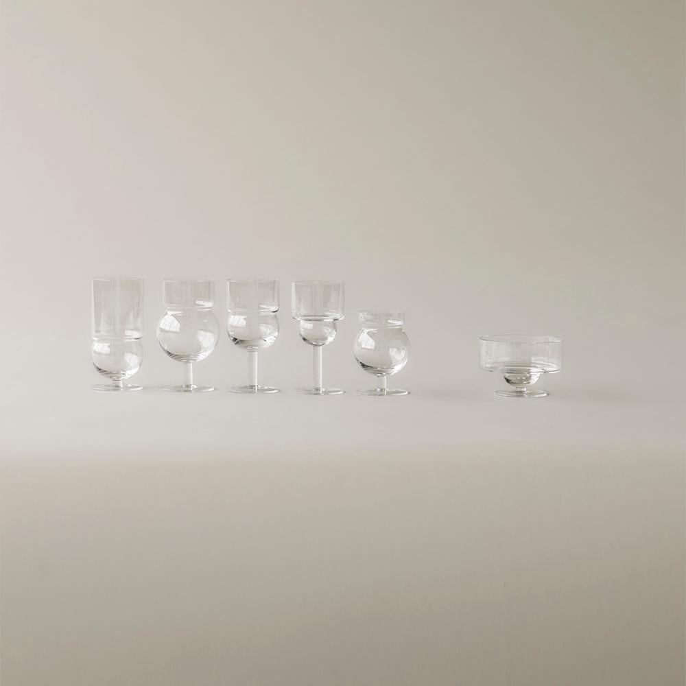 Glass tableware designed by Joe Colombo in 1968. 

Joe Colombo believed in democratic and functional design. In his lifetime he designed a wide range of different drinking glasses. Something that seems very to the point as he was said to love