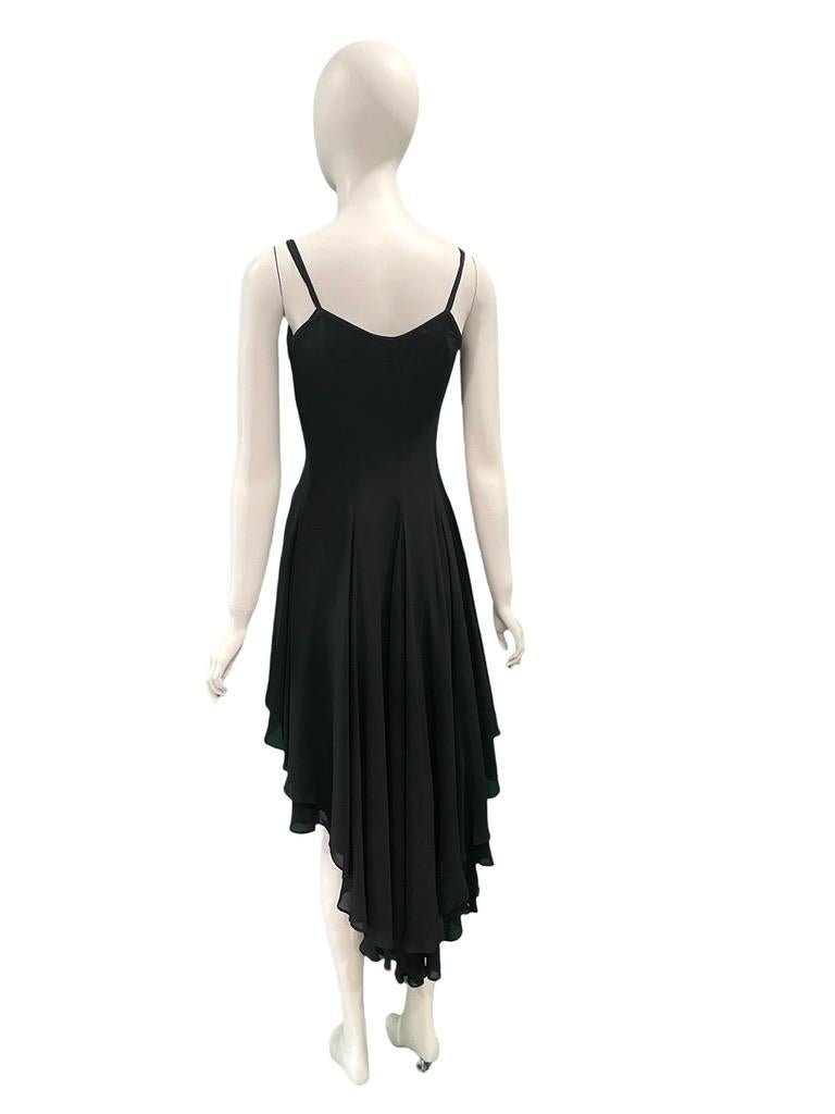 Complice black slip dress with longer hem in back

Condition: Good, some all over wear
100% Viscose
28