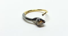 Compliments Toss Up with One of a Kind Pear Shaped Colored Diamond Gold Ring