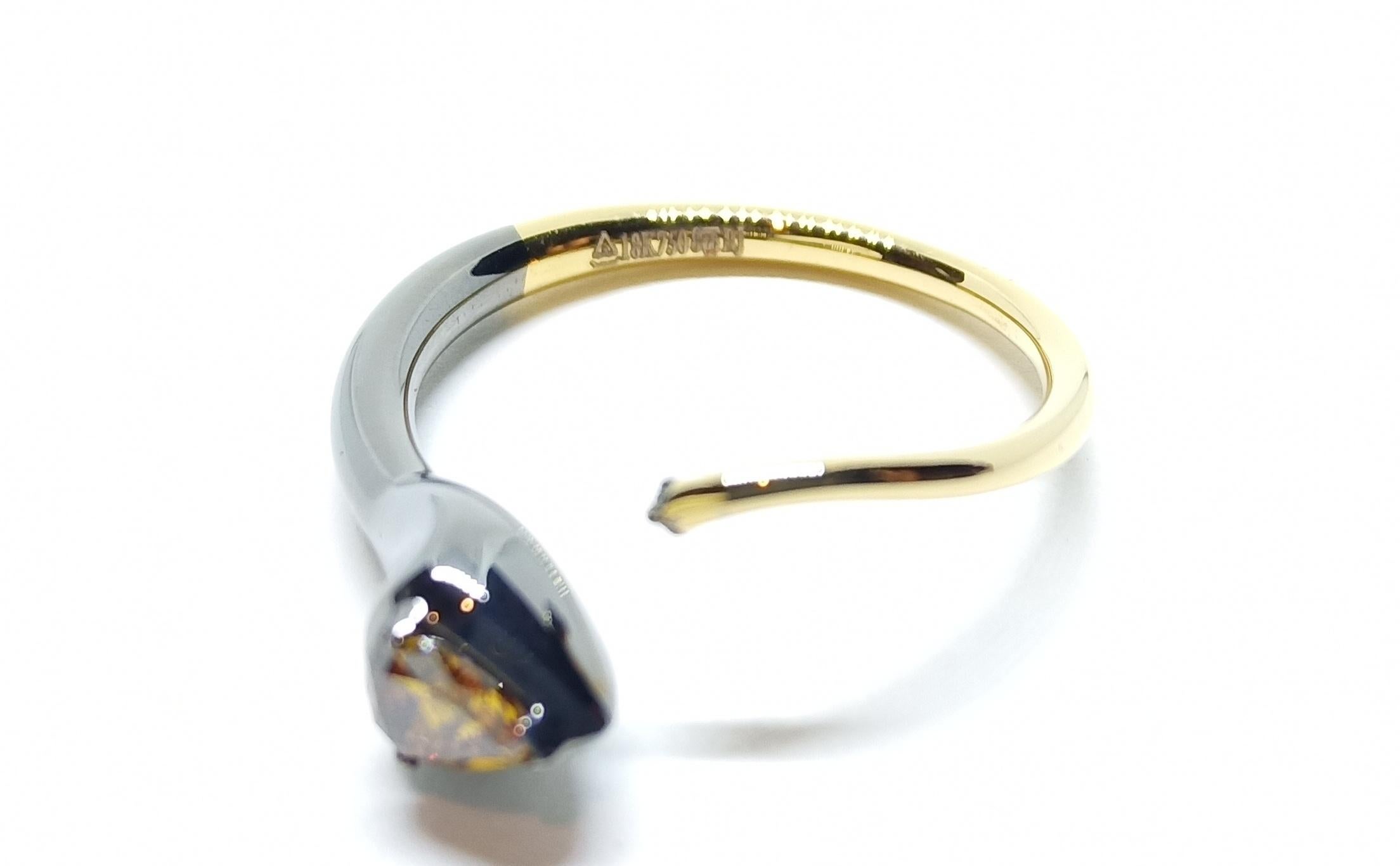 Contemporary Compliments Toss Up with One of a Kind Pear Shaped Colored Diamond Gold Ring For Sale