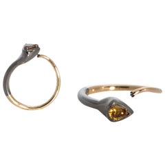 Compliments Toss Up with One of a Kind Pear Shaped Colored Diamond Gold Ring