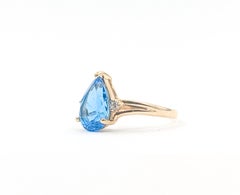 Composed Blue Topaz & Diamond Ring in 14k Yellow Gold