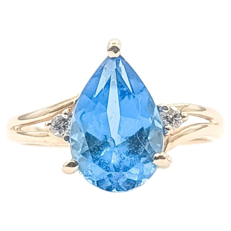 Composed Blue Topaz & Diamond Ring in 14k Yellow Gold