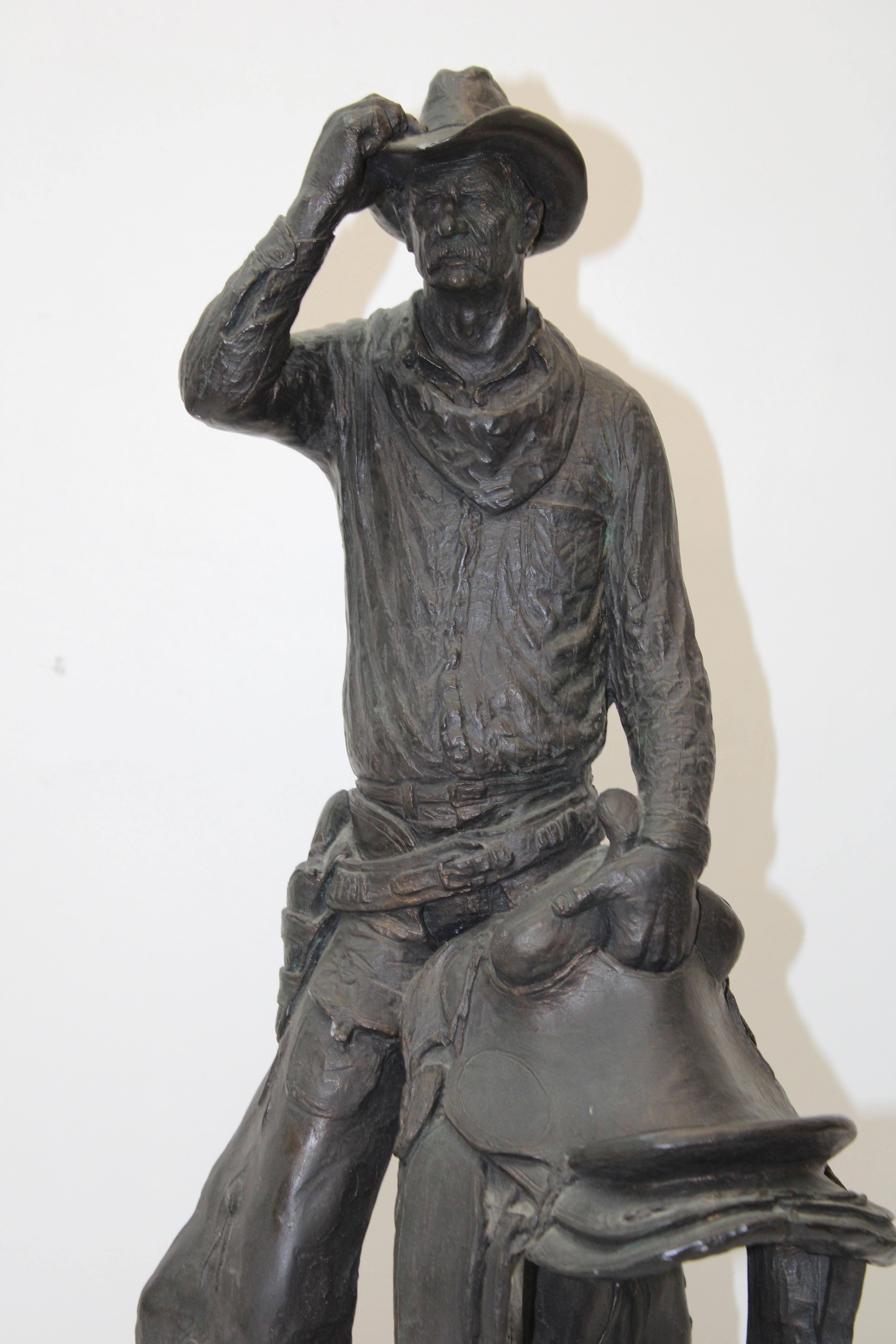 C. 20th Century

Composite Cowboy Figure w/ Saddle ( Signed ).
