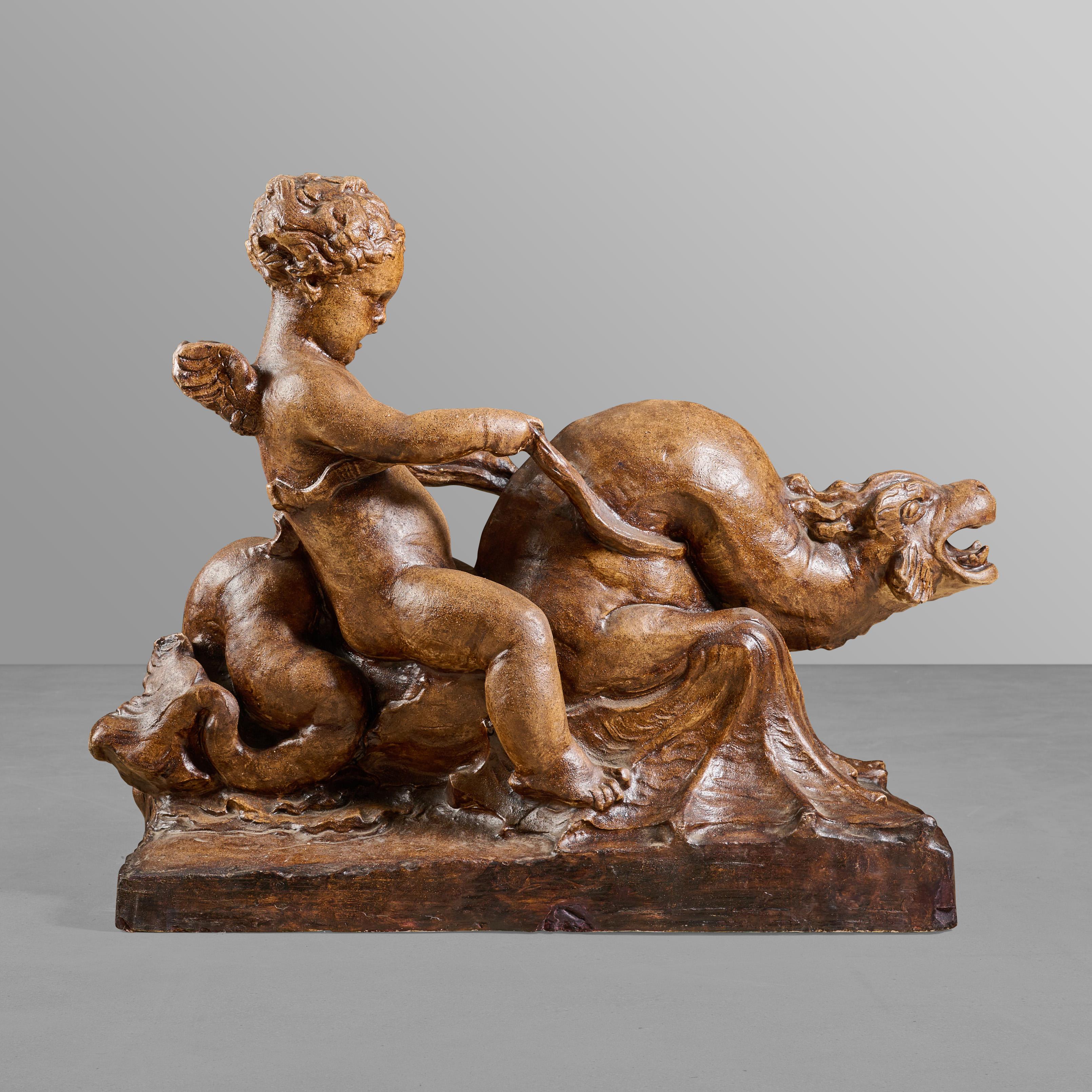Composition maquette for a fountain. Putti/angel riding a mythical sea creature. This maquette was used to model the bronze castings for a fountain.