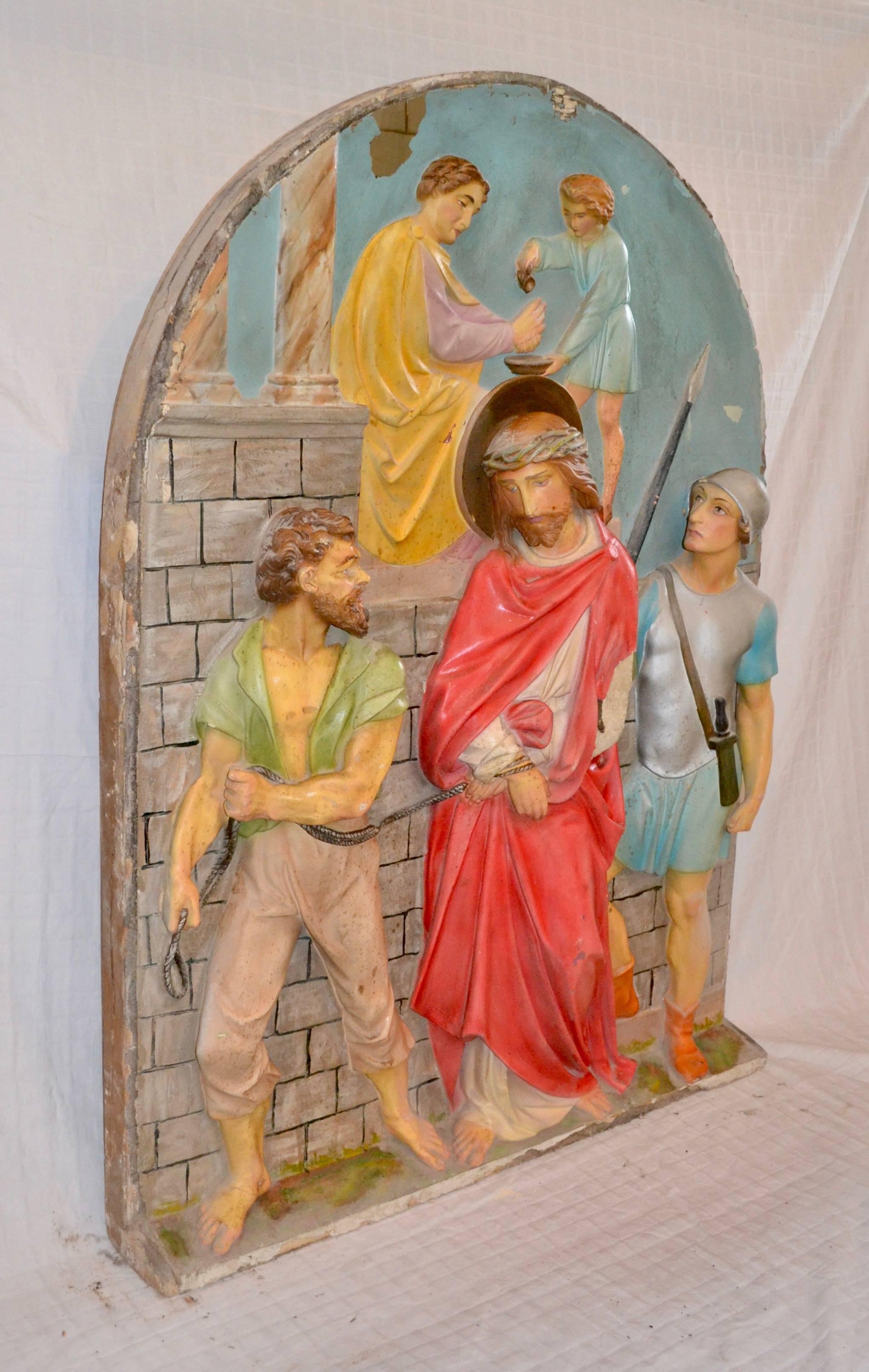 These unusual Stations of the Cross are possible De Prado Studios. The panels are in good condition with some minor losses. The vibrant colors are consistent with and characteristic of a midcentury repaint. Panel shown is one of eight remaining with