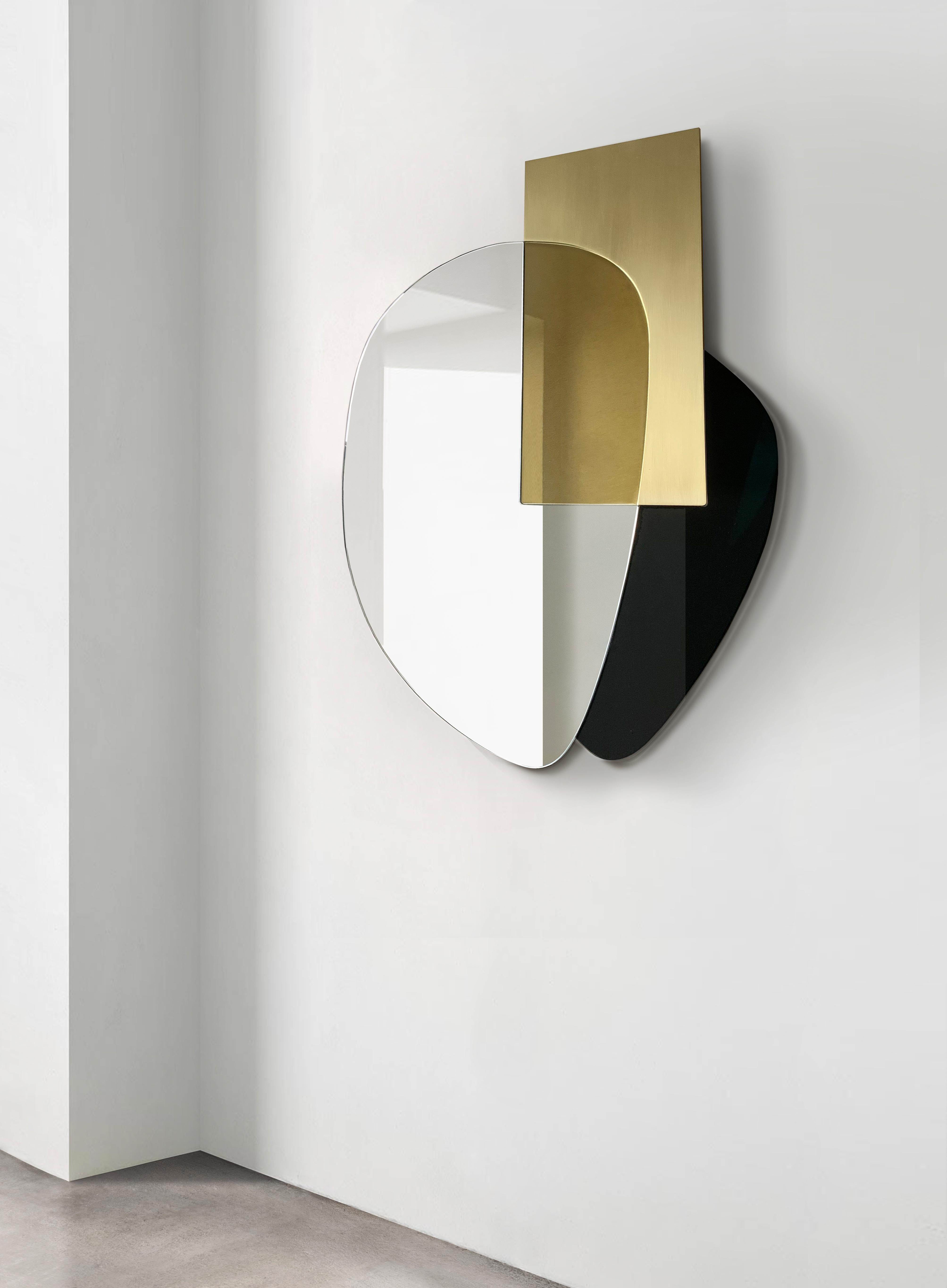 Composizione Astratta mirror is a tribute to light and matter, to reflection and transparency in which coloured mirrors and metal surfaces seem to intersect and intertwine to reveal new poetic and compositional qualities.
The apparent transparency