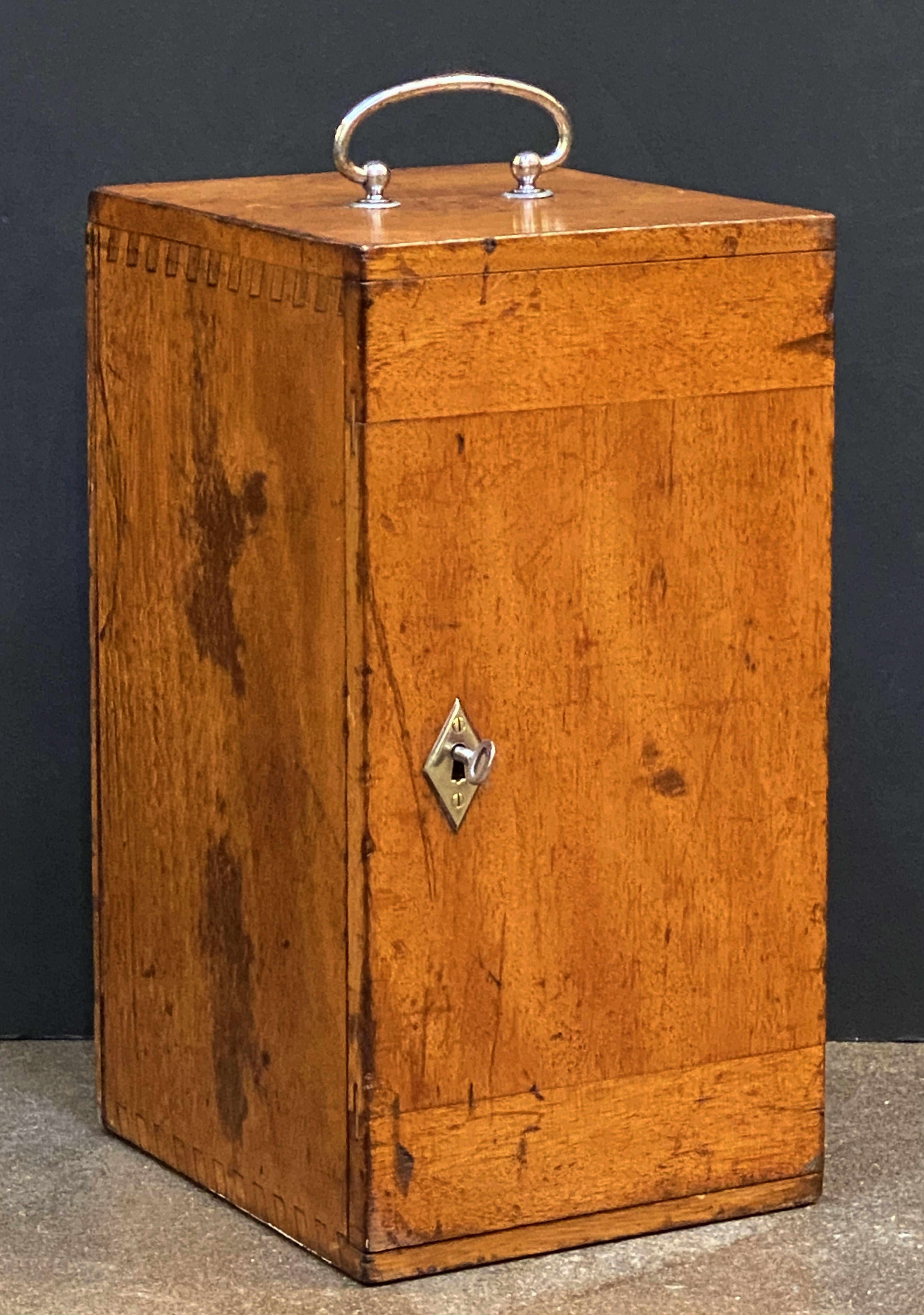 A fine working German compound microscope, circa 1910, by R. Winkel, Gottingen, Germany, in a fitted box of mahogany with nickel hardware and key.

Marked on column front: R. Winkel, Gottingen, Nr. 18507

With removable two fitted wood sliding