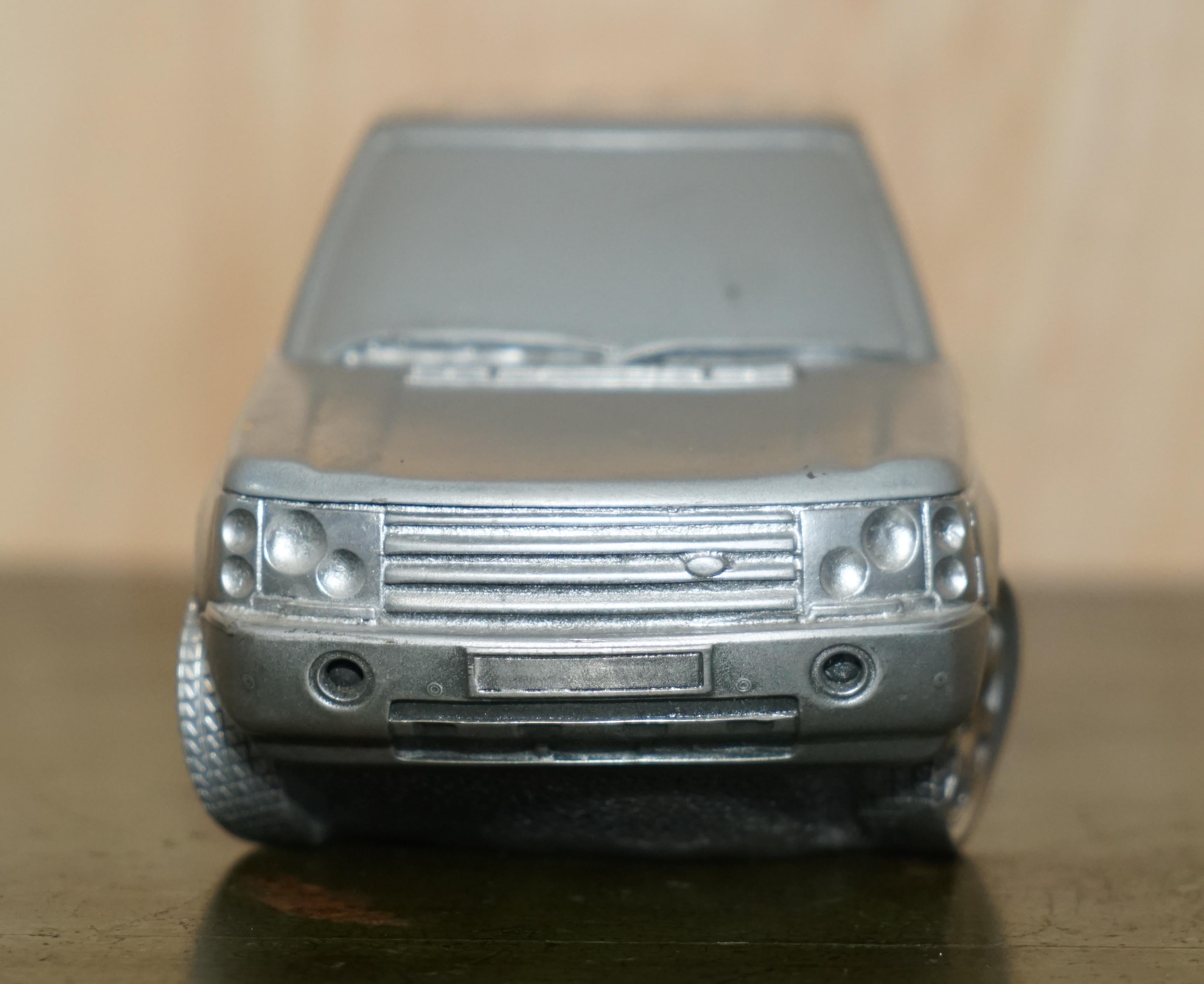 We are is delighted to offer for sale this lovely vintage circa 2005 Compulsion Gallery Pewter model of a Range Rover L322 Third Generation car

I have another of these pewter cars listed under my other items which is a Jaguar Mark I

This car