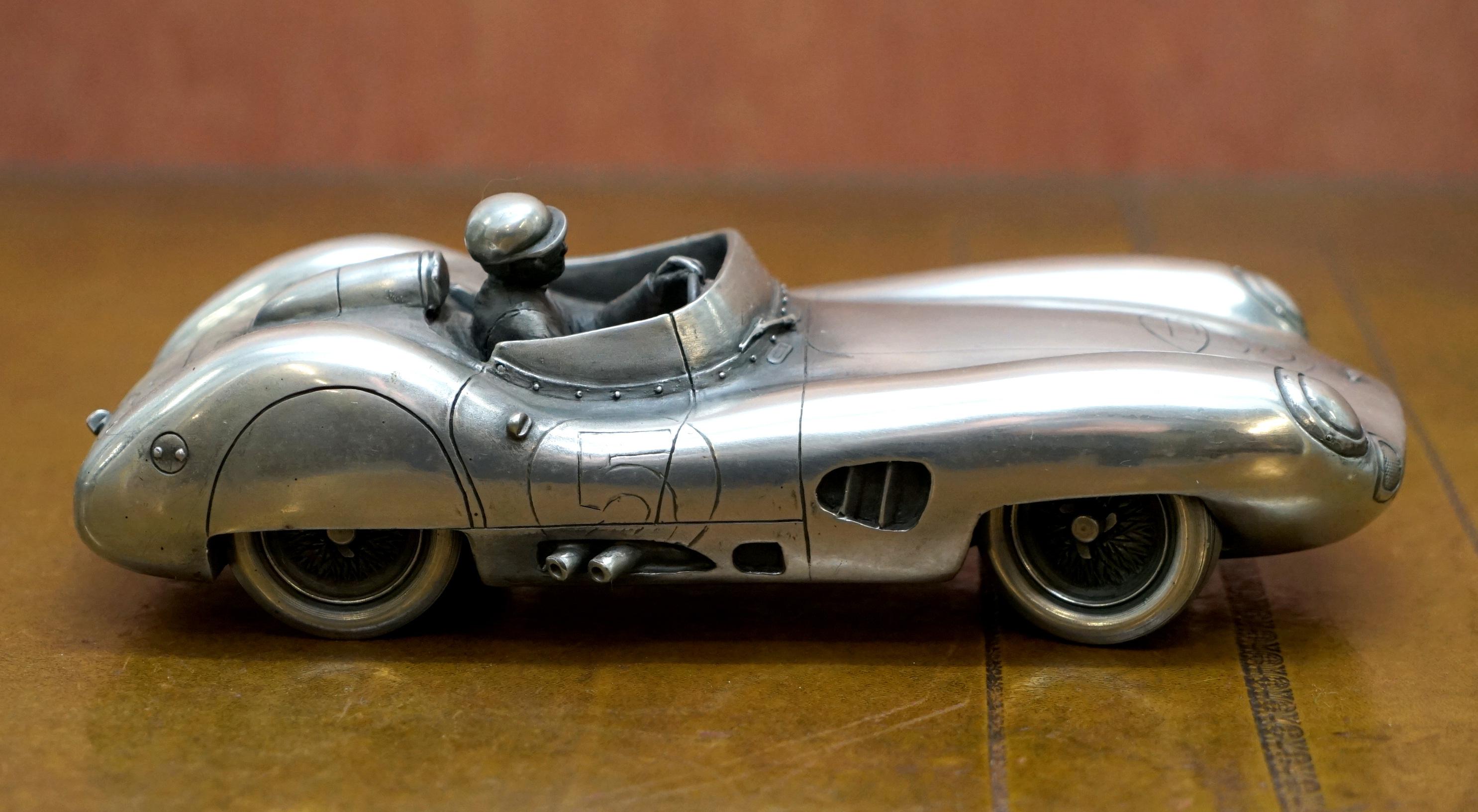 We are delighted to offer for sale this lovely original Pewter plated large compulsion gallery Aston Martin Le Mans 24 hour race DBR1 1959

This is the largest I have ever seen, its in perfect vintage condition

The Aston Martin DBR1 was a