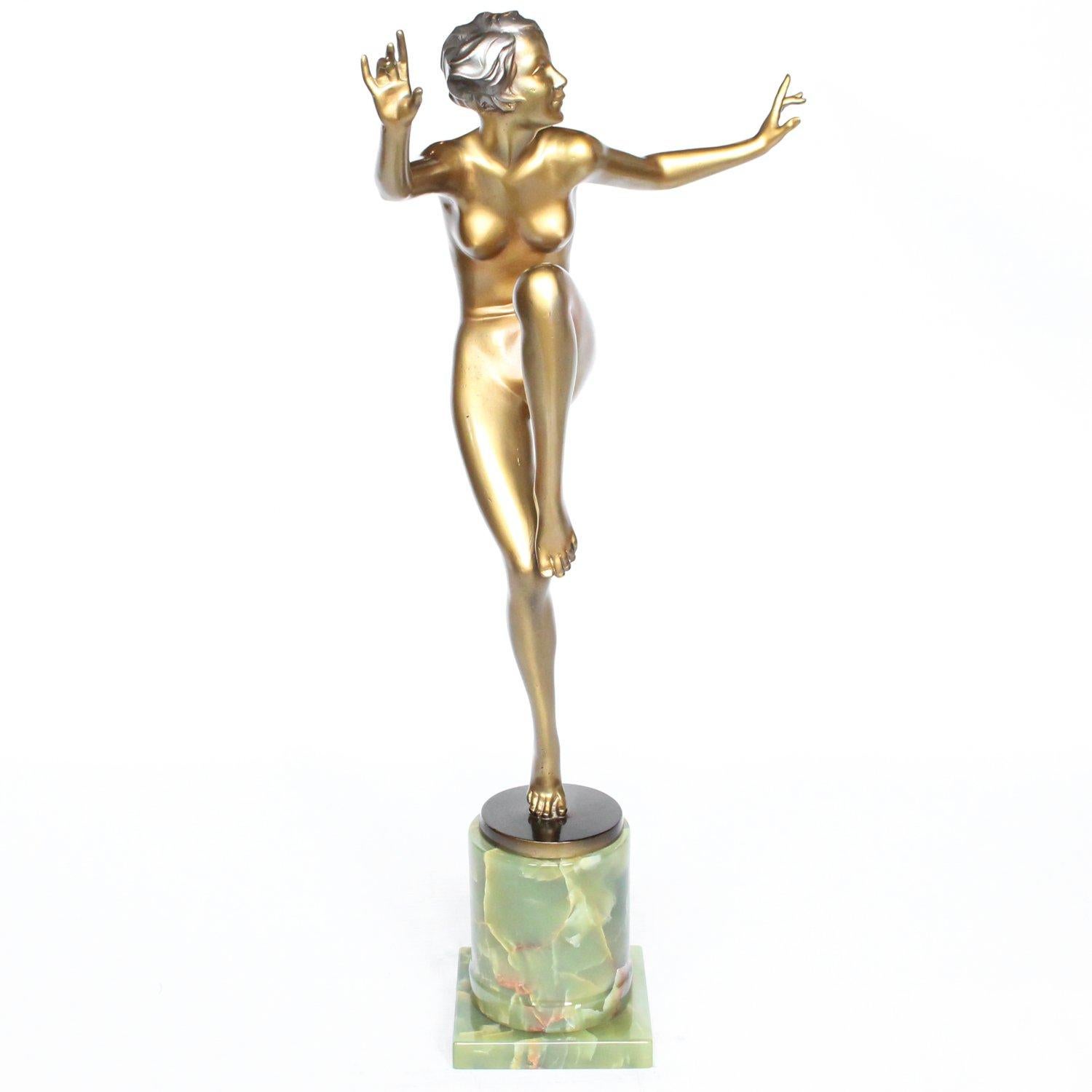 Con Brio, a large Art Deco, cold painted bronze figure by Josef Lorenzl, (1892-1950). A dancing woman in stylized pose set over a green onyx plinth.

Signed Lorenzl to bronze.

Josef Lorenzl, born 1st September 1892 began his career at a foundry