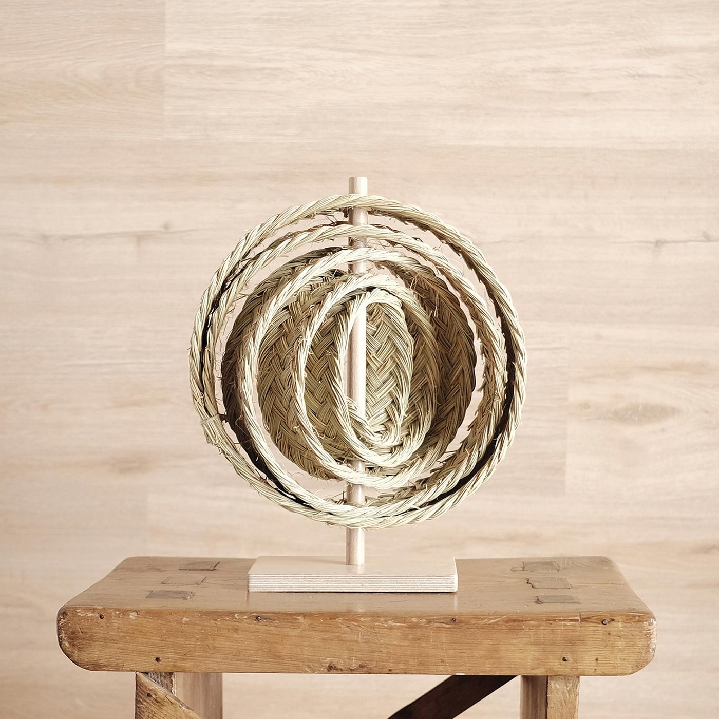 An organic modern sculpture crafted with vegetable fibers crafted in Spain by Gabriela de Sagarminaga. Inspired by the idea of circularity of life, this sculpture was born from the interest in the lightness of the castings. It is produced with