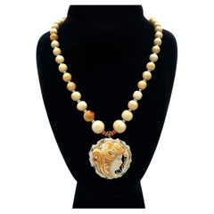 Conch Shell Necklace with Carved Cameo Pendant