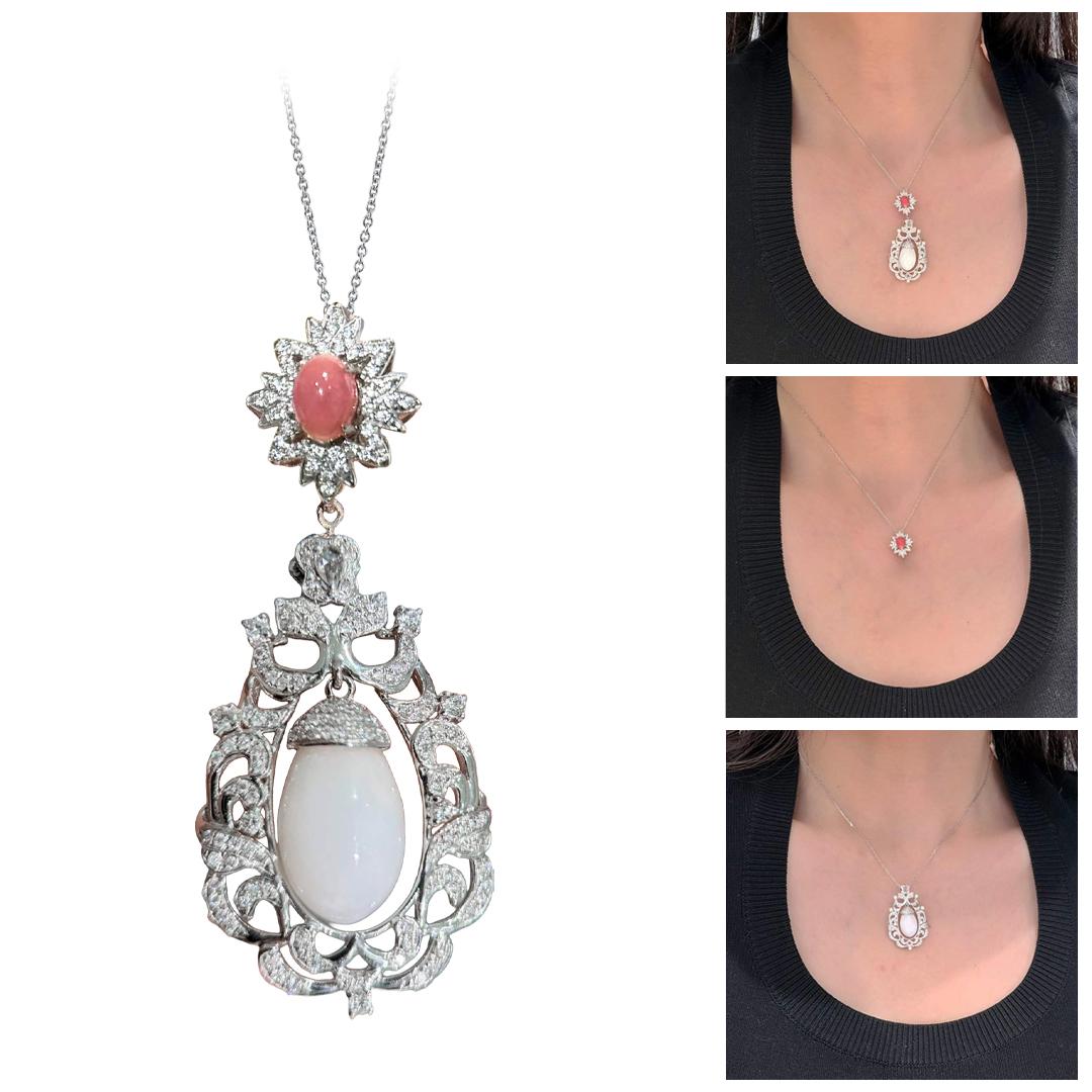 Strati di storia e di bellezza si dispiegano in questo ciondolo di ispirazione bizantina, dove si incontrano due tesori rari: una perla di conchiglia rosa tenue e una perla di vongola luminosa. Insieme formano un Jewell senza tempo, regale e