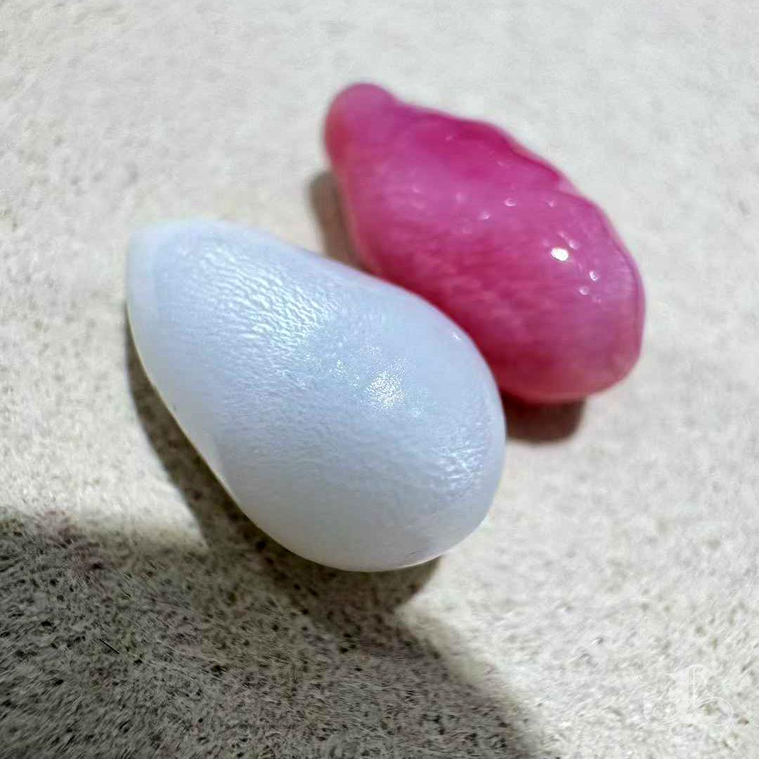Uncut 【Conchéa】Flame Kissed Twins — 5.49ct Conch Pearl & 6.0ct Giant Clam Pearl For Sale