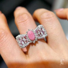 【Conchéa】Flamingo Pink Conch Pearl Bow Ring with Diamonds & Rubies — 1.91 ct