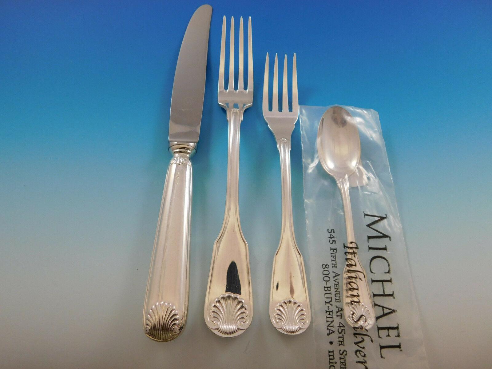 This gorgeous shell motif Italian collection flatware is large and heavy European size, meticulously crafted in Italy of the finest silver.

Conchiglia AKA shell by Zarmella Argenti, retailed by Michael C Fina, Italian sterling silver flatware set -