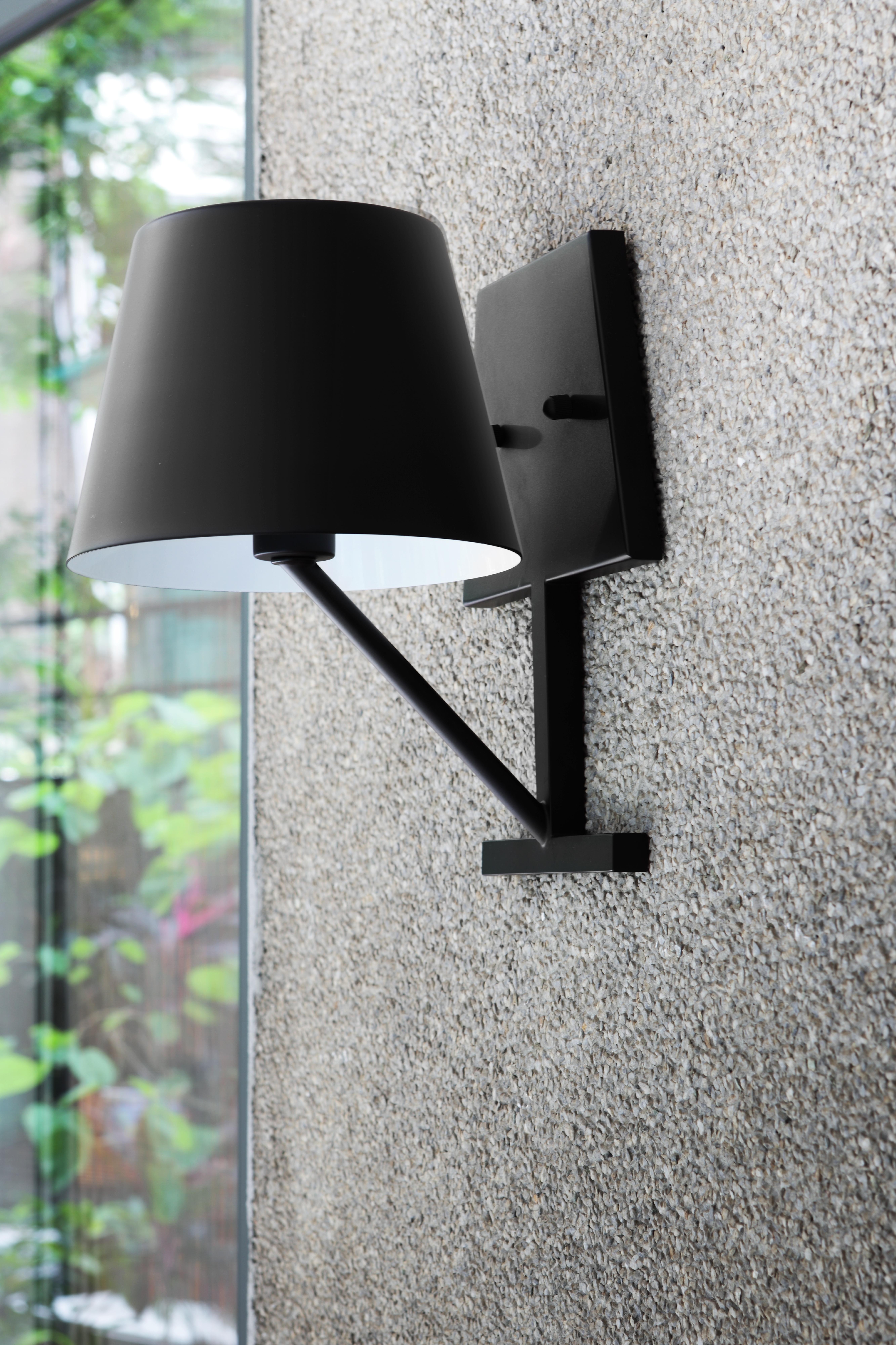 Cast a shadow on yourself. CONCOM Wall Sconce creates a fascinating visual illusion in space, taking something 2D and morphing it into some 3D. Allow CONCOM Wall Sconce to be your backdrop, gently lighting up your surroundings in which people come