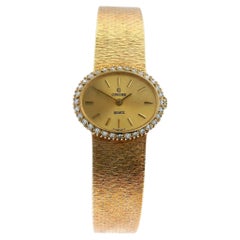 Concord Montre pour femme en or jaune 14 carats avec quartz et diamants