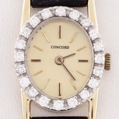 Concord 14 Karat Gold Quartz Watch with Diamond Bezel and Leather Band
