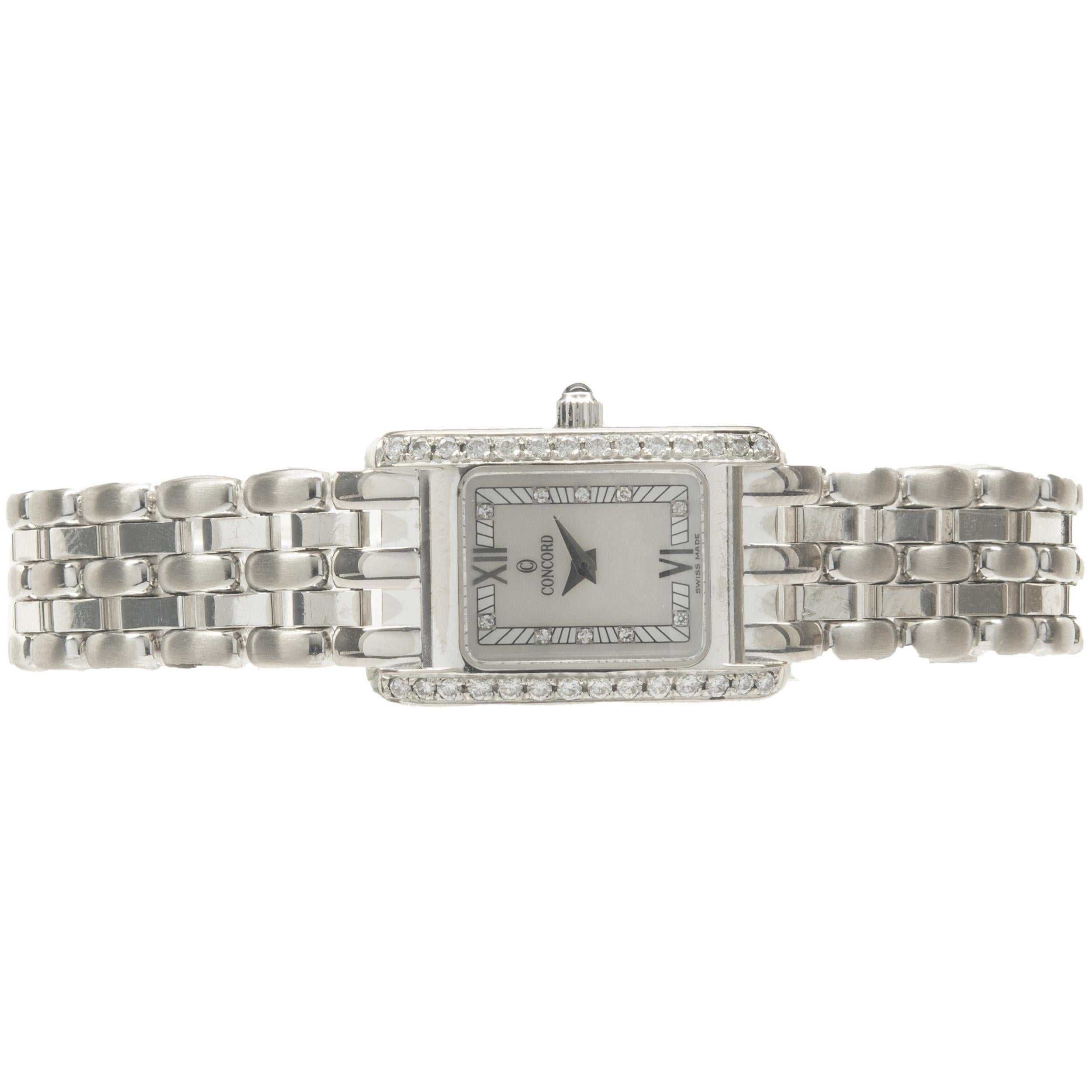 Movement: quartz
Function: hours, minutes
Case: 24mm rectangular case, diamond bezel, sapphire crystal, pull/push crown, water resistant
Dial: mother of pearl diamond dial
Band: Concord 18K white gold panther link bracelet, integrated clasp
Serial#: