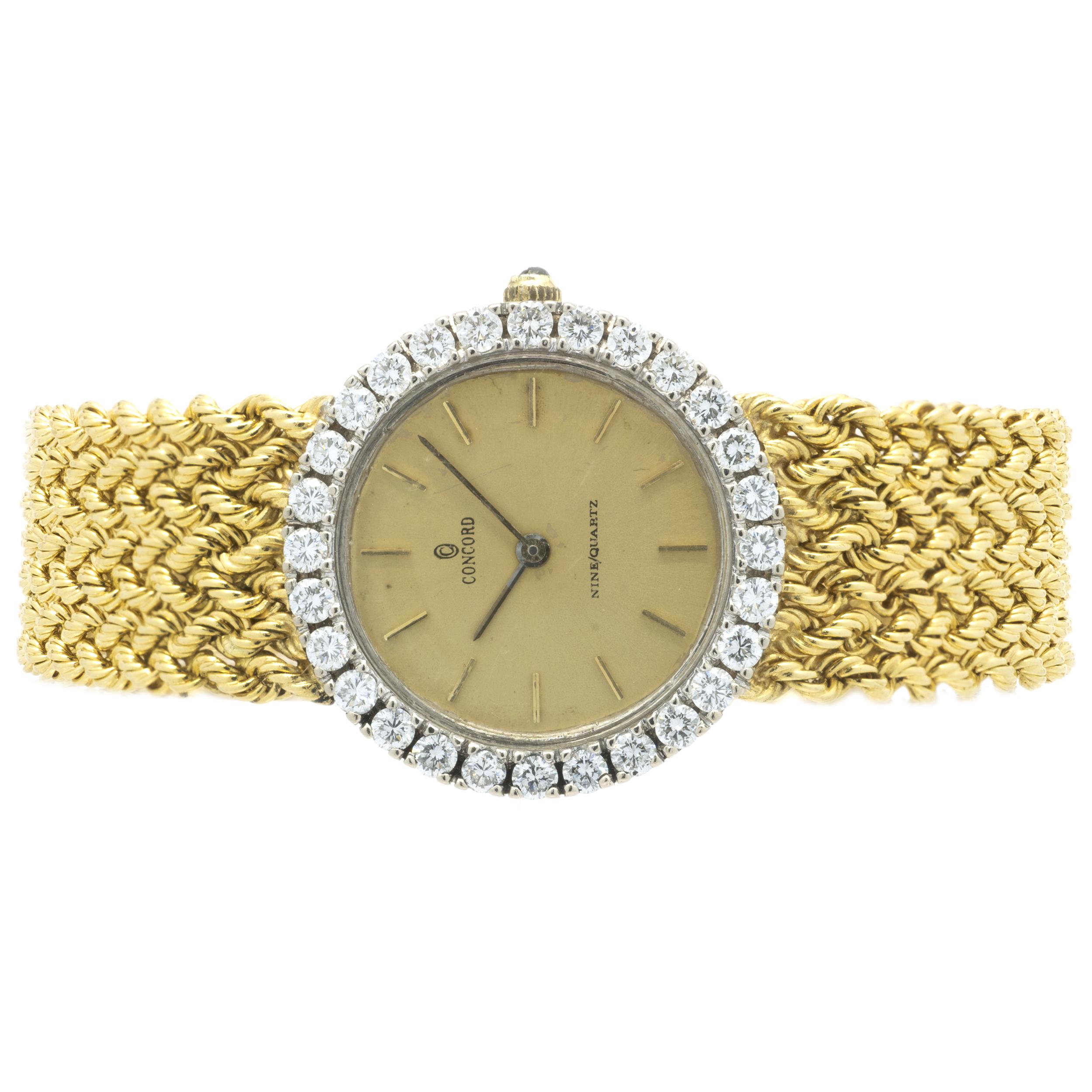 Movement: quartz
Function: hours, minutes
Case: 25mm 18K yellow gold round case, sapphire crystal, pull/push crown, water resistant, 0.84cttw round brilliant cut diamond bezel
Dial: champagne stick dial
Band: Concord 18KY mesh bracelet
Serial#: